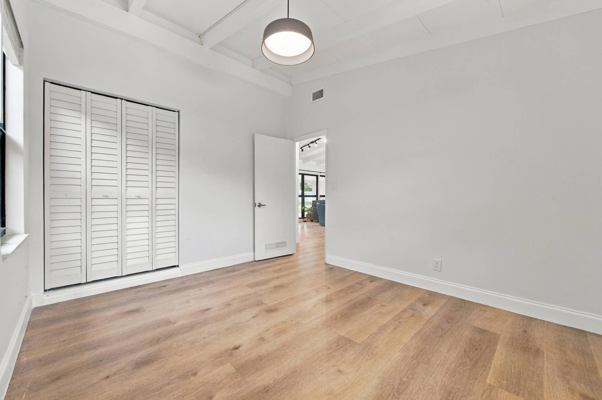 2536 GULFSTREAM Lane, Fort Lauderdale, FL 33312 Wood-finish flooring, white walls, and a contemporary ceiling light fixture