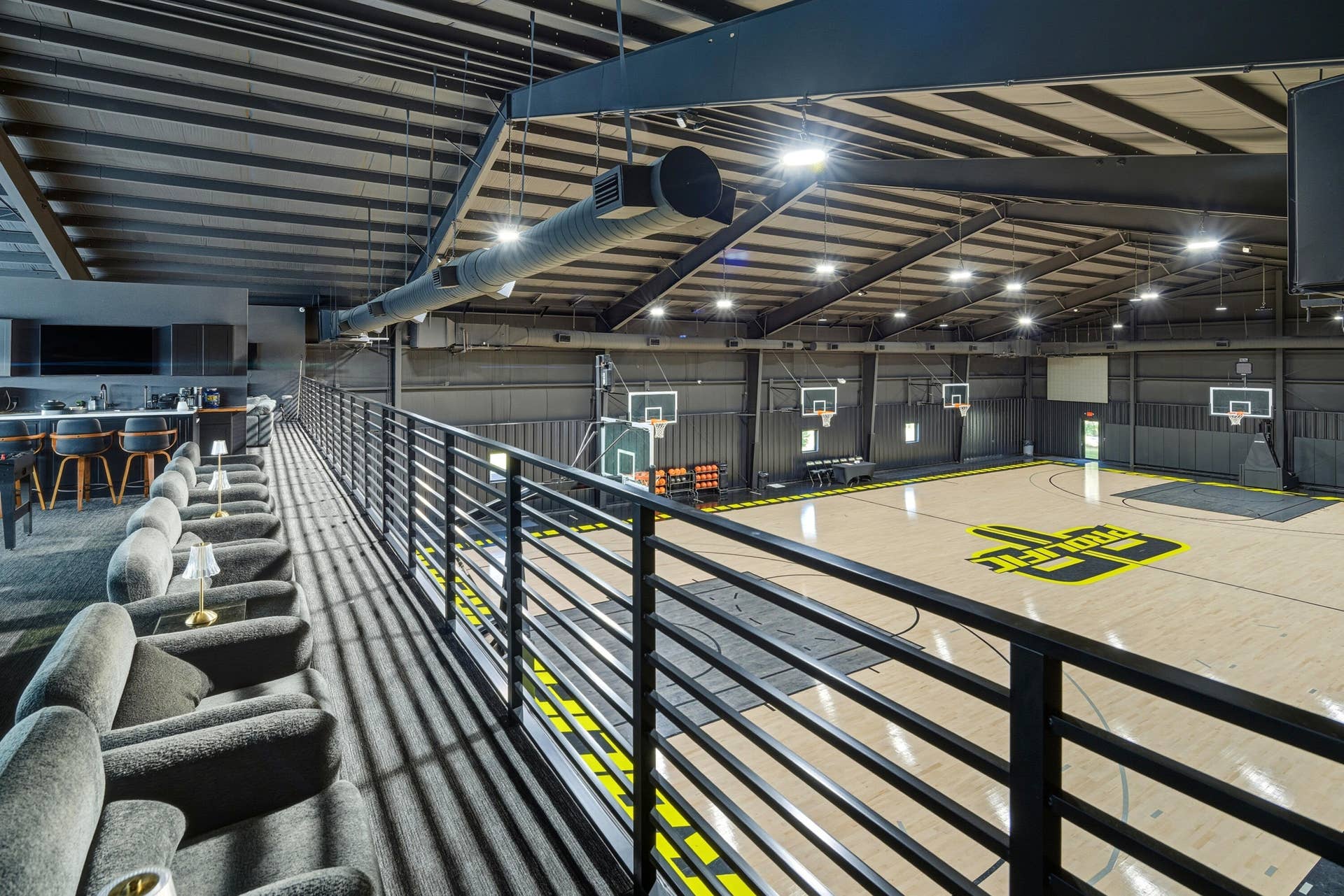 13920 Stirling Road, Southwest Ranches, FL 33330 FACILITY BASKETBALL COURT WITH UPSTAIRS BAR AND SEATING