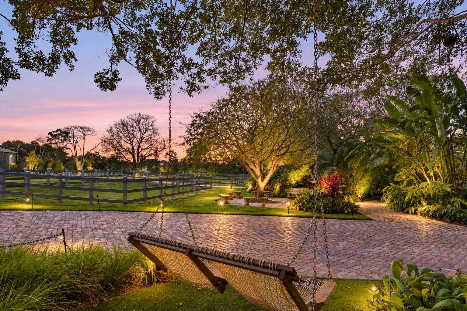 13920 Stirling Road, Southwest Ranches, FL 33330 Twilight Estate with Illuminated Gardens