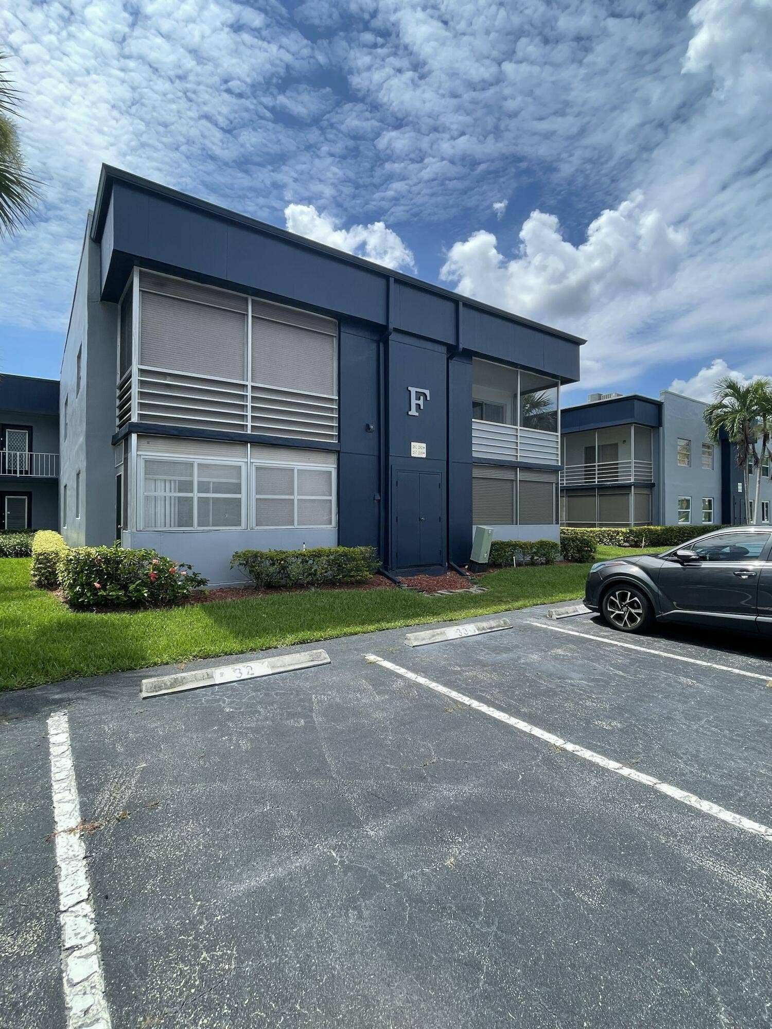 Burgundy Building F & Assigned Parking Spot