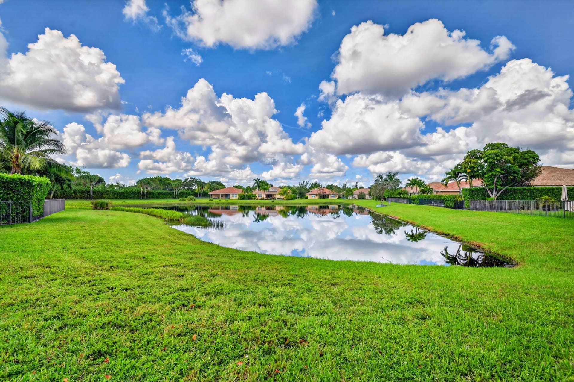 9070 WINTERHAVEN Circle, West Palm Beach, FL 33411 Serene Lake View from Family Room