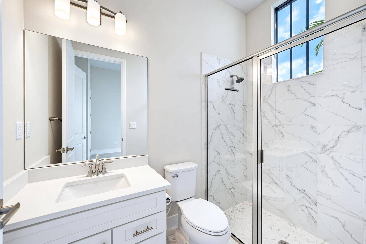 Bright Modern Bathroom with Marble Showe