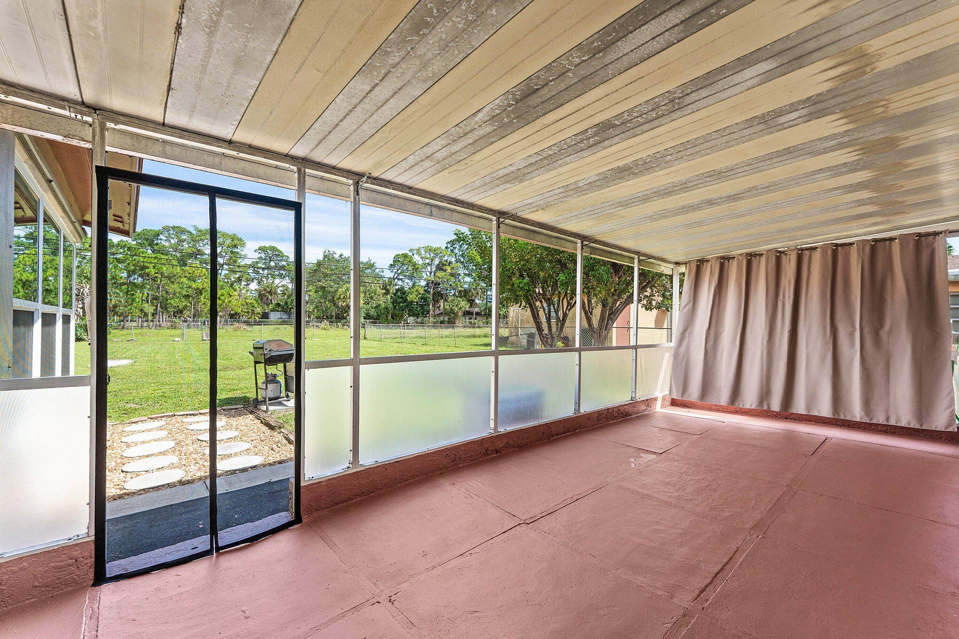 740 Caroline Avenue, West Palm Beach, FL 33413 COVERED SCREENED PATIO!