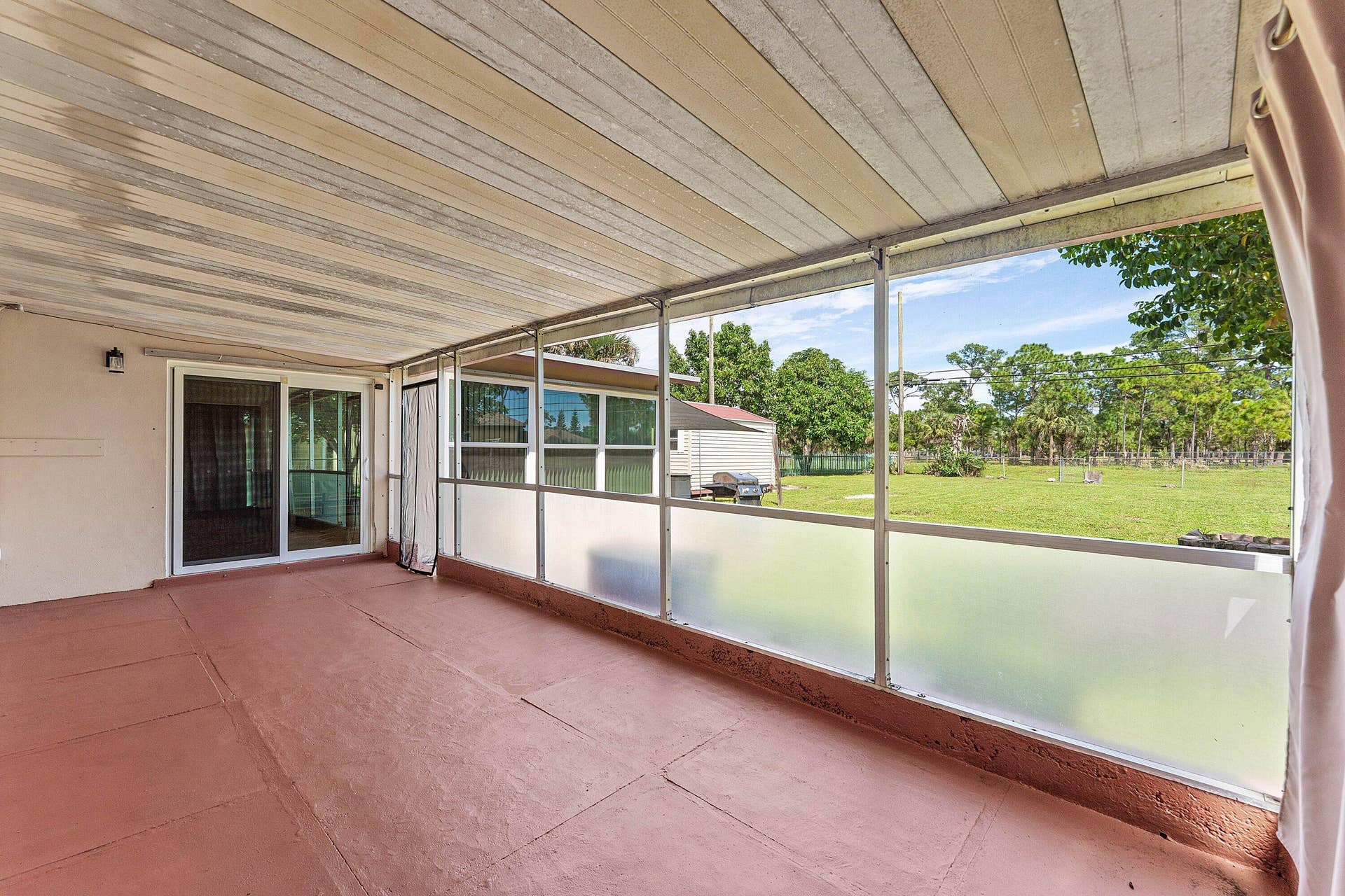 740 Caroline Avenue, West Palm Beach, FL 33413 COVERED SCREENED PATIO!