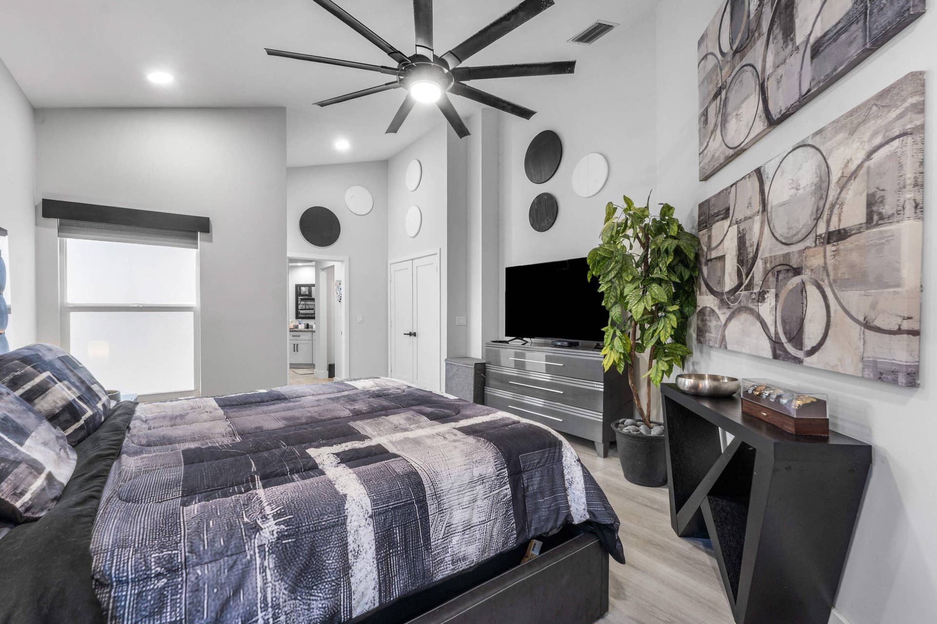 13138 Touchstone Place, Palm Beach Gardens, FL 33418 Sloped ceilings and recessed lighting complement the modern ceiling fan