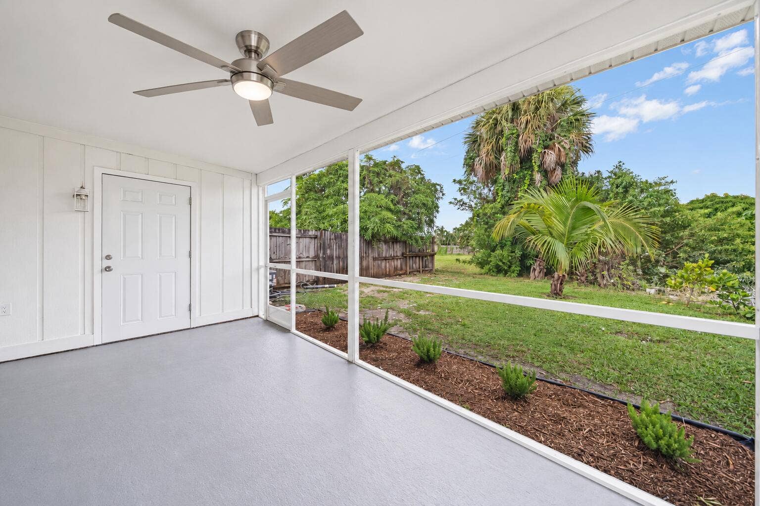 Modern Screened Patio with Ceiling Fan