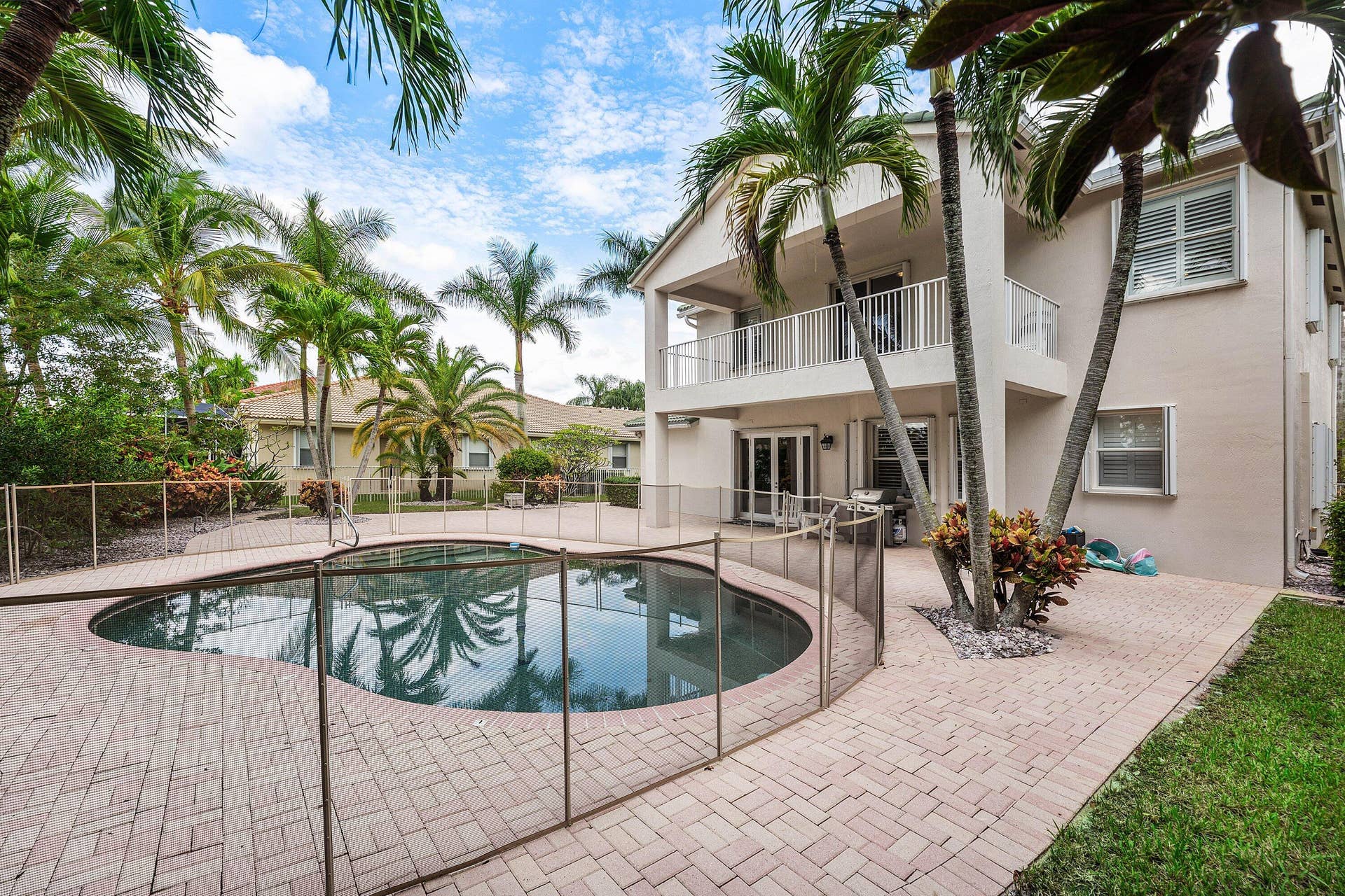 Large patio with private pool and lake views