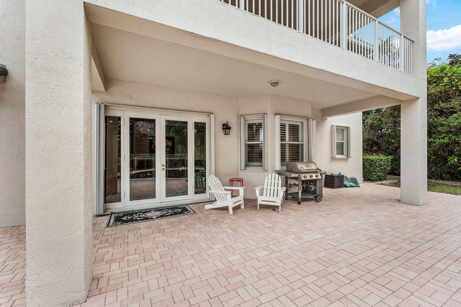 Large patio with private pool and lake views
