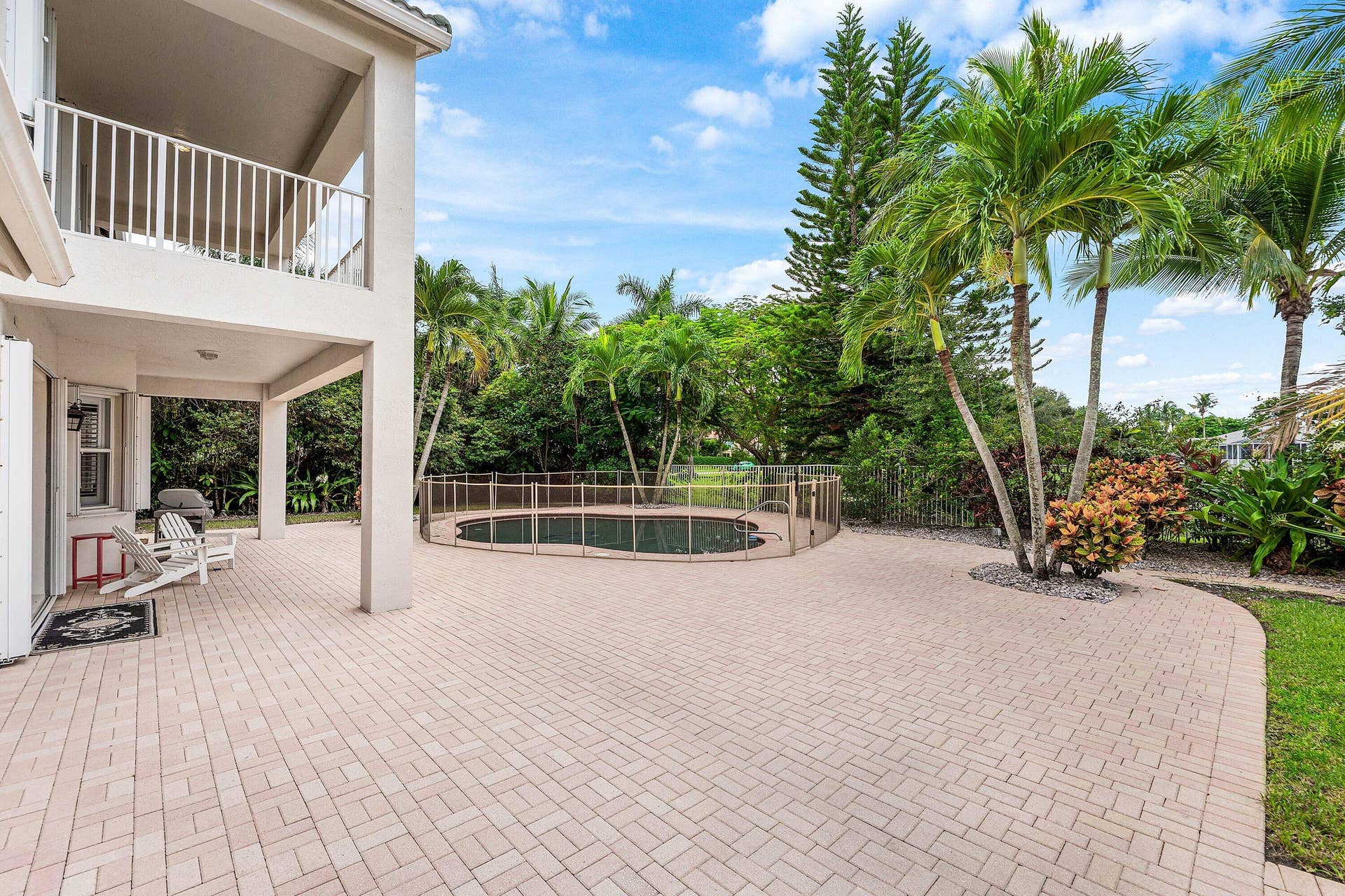 Large patio with private pool and lake views