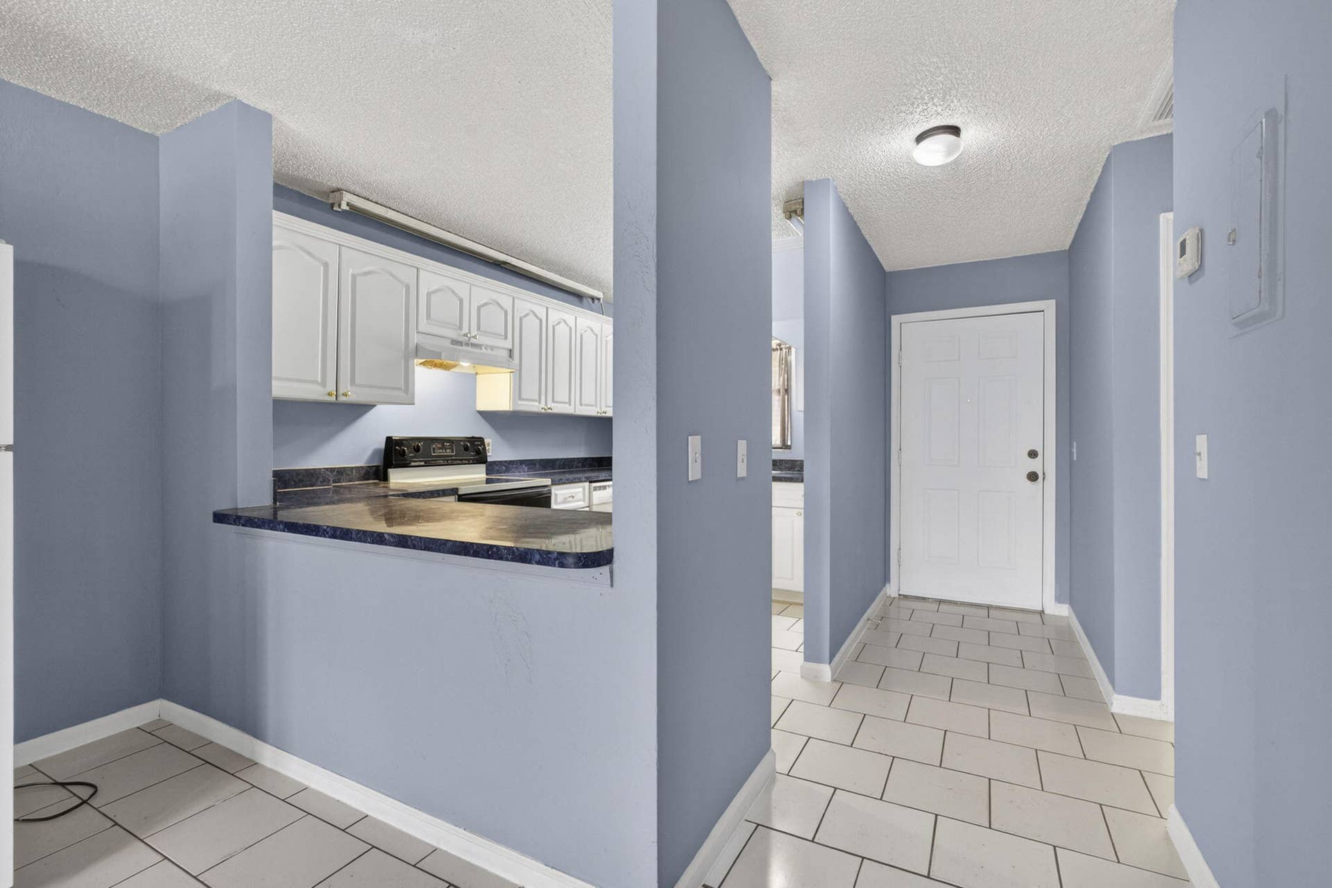 4661 PERTH Road, West Palm Beach, FL 33415 Kitchen_with_entrance_1