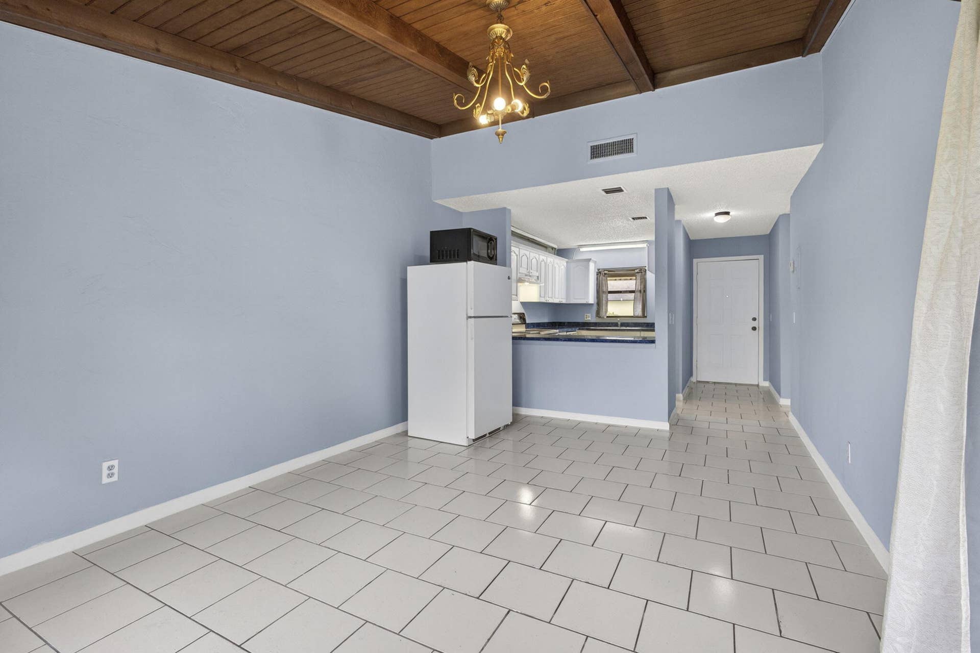 4661 PERTH Road, West Palm Beach, FL 33415 Kitchen_with_entrance_and_living_room