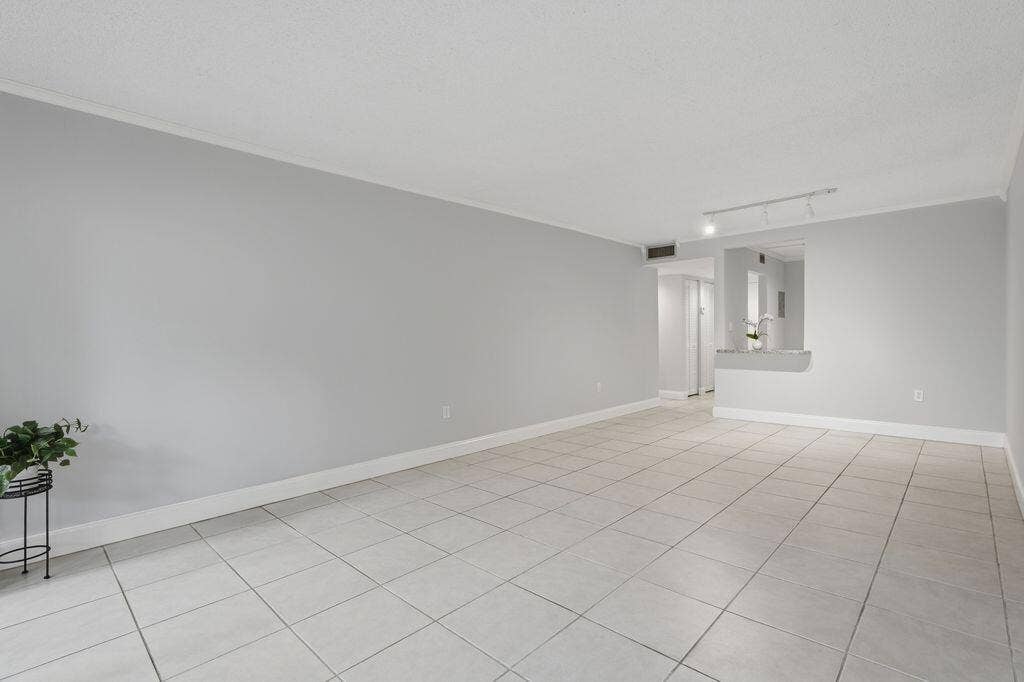 485 N PINE ISLAND Road, #A105, Plantation, FL 33324 Looking at living room from patio area