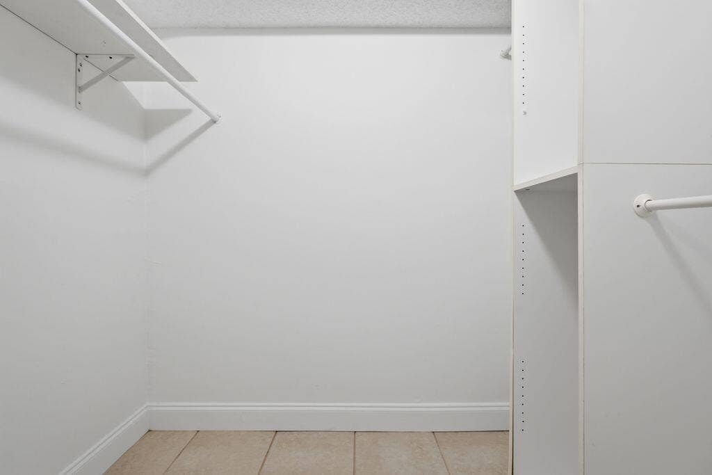 485 N PINE ISLAND Road, #A105, Plantation, FL 33324 One of the two walk in closets with closet cabinetry