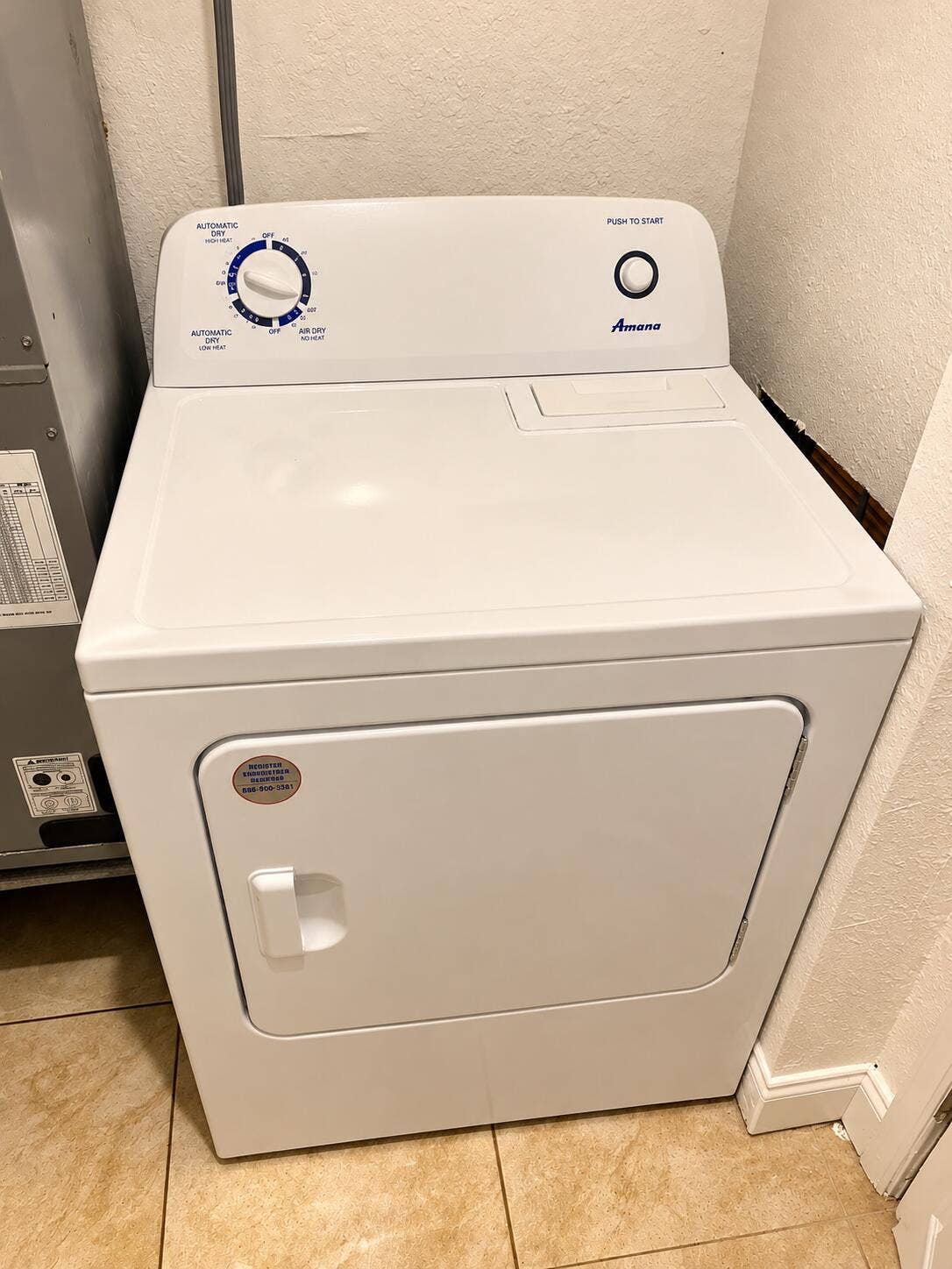 Amana Dryer in a Warm Laundry Nook