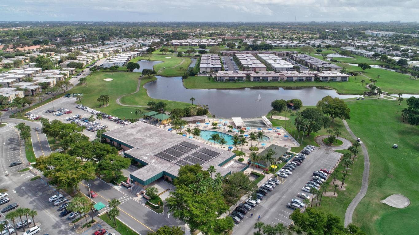 452 Brittany J, Delray Beach, FL 33446 aerial club pool