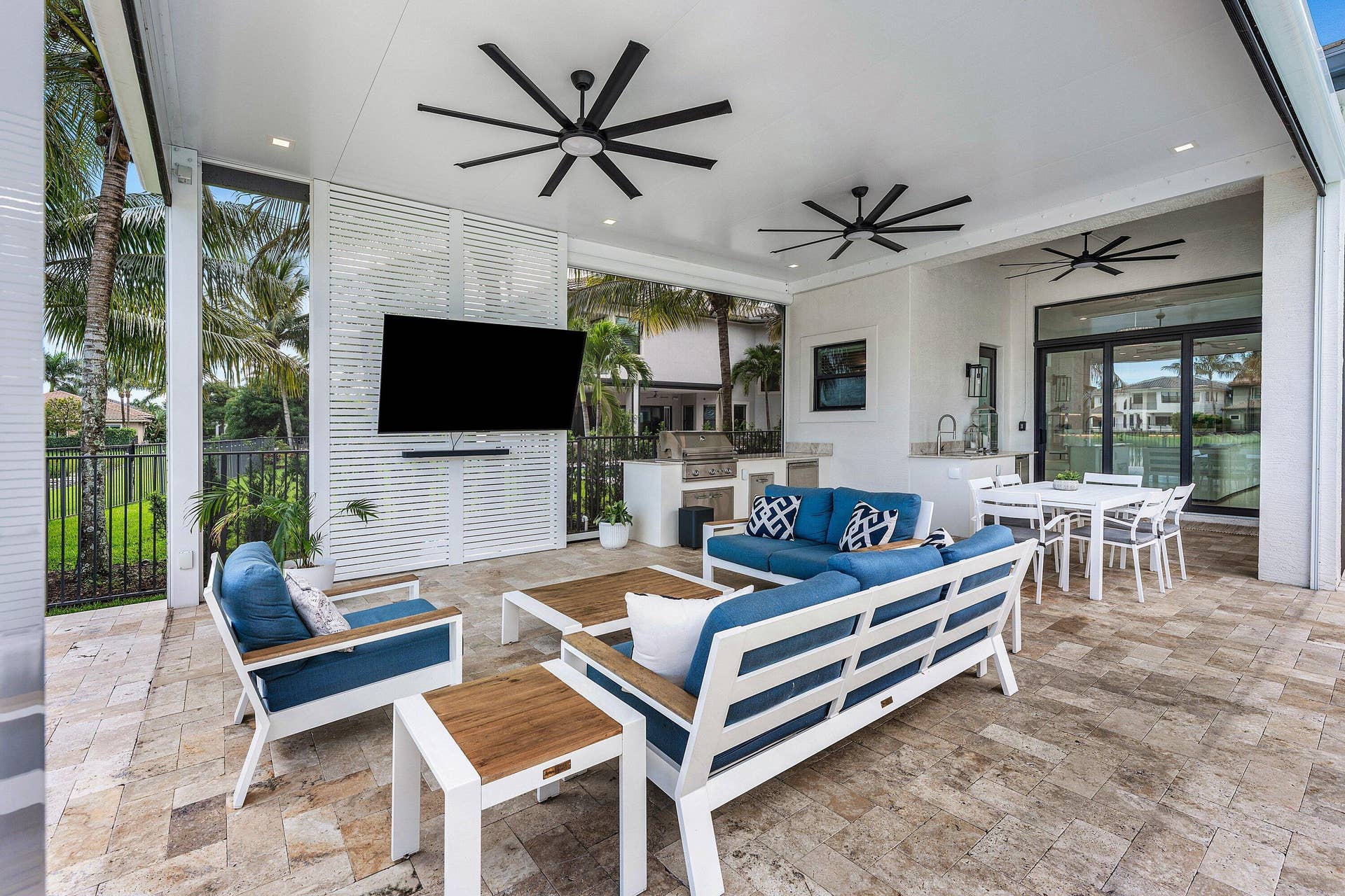 16716 Strasbourg Lane, Delray Beach, FL 33446 Outdoor living room with retractable screens