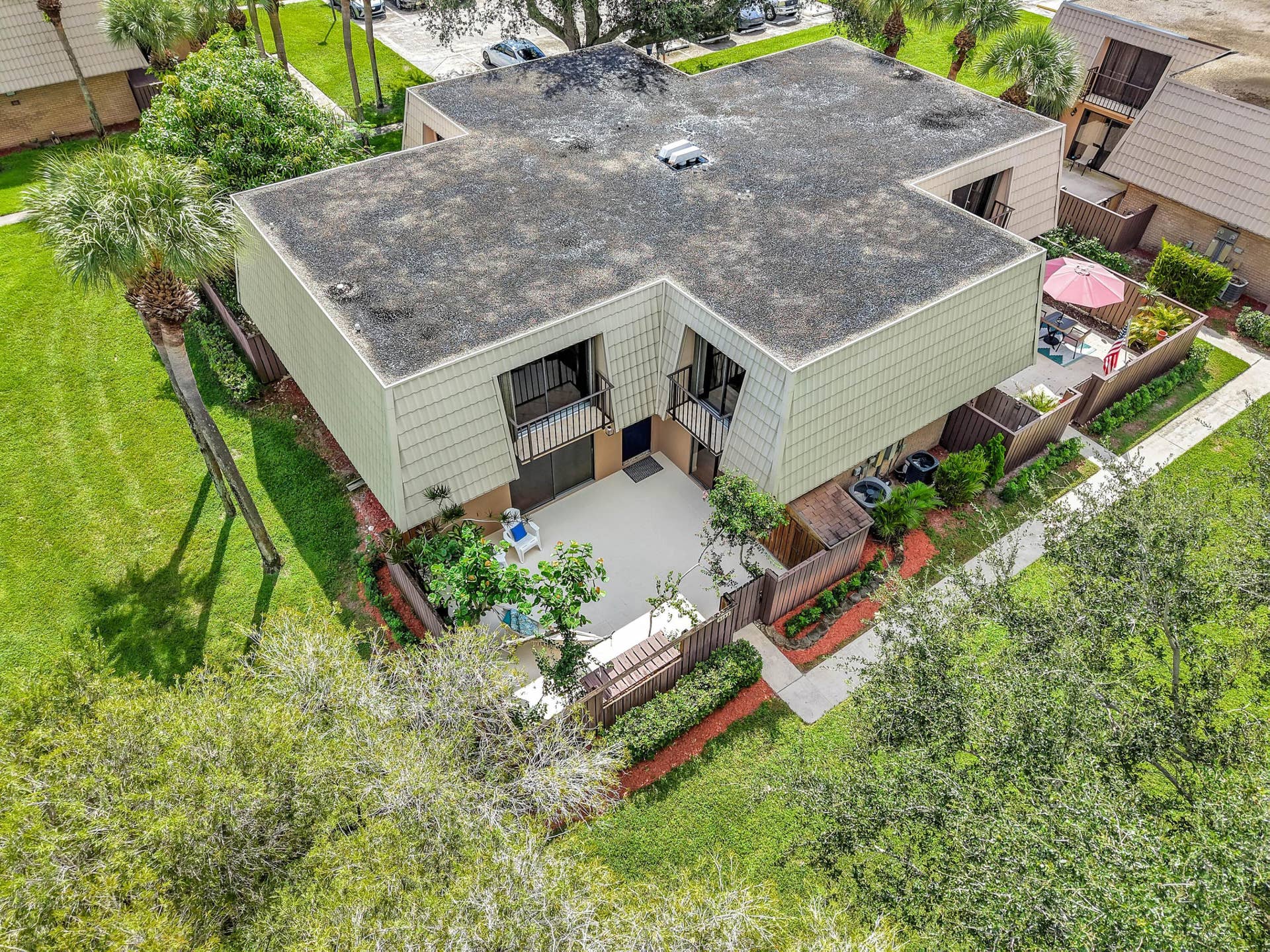 Aerial view of townhome and patio