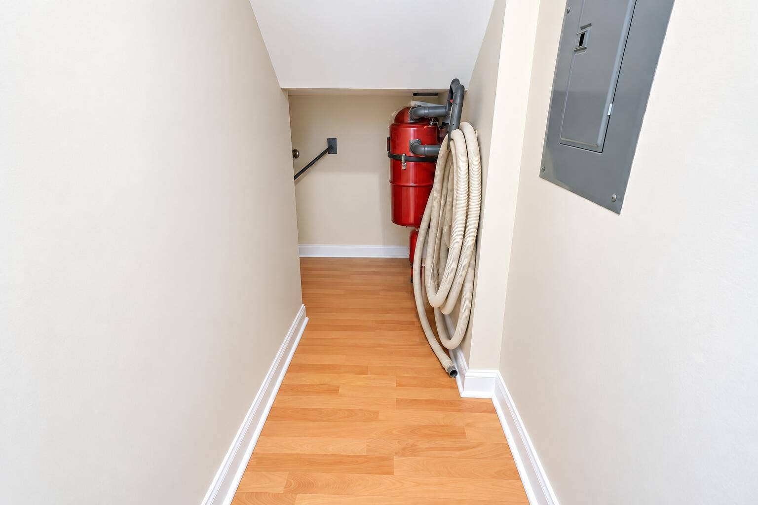 Storage closet under stairwell and central Vacuum system