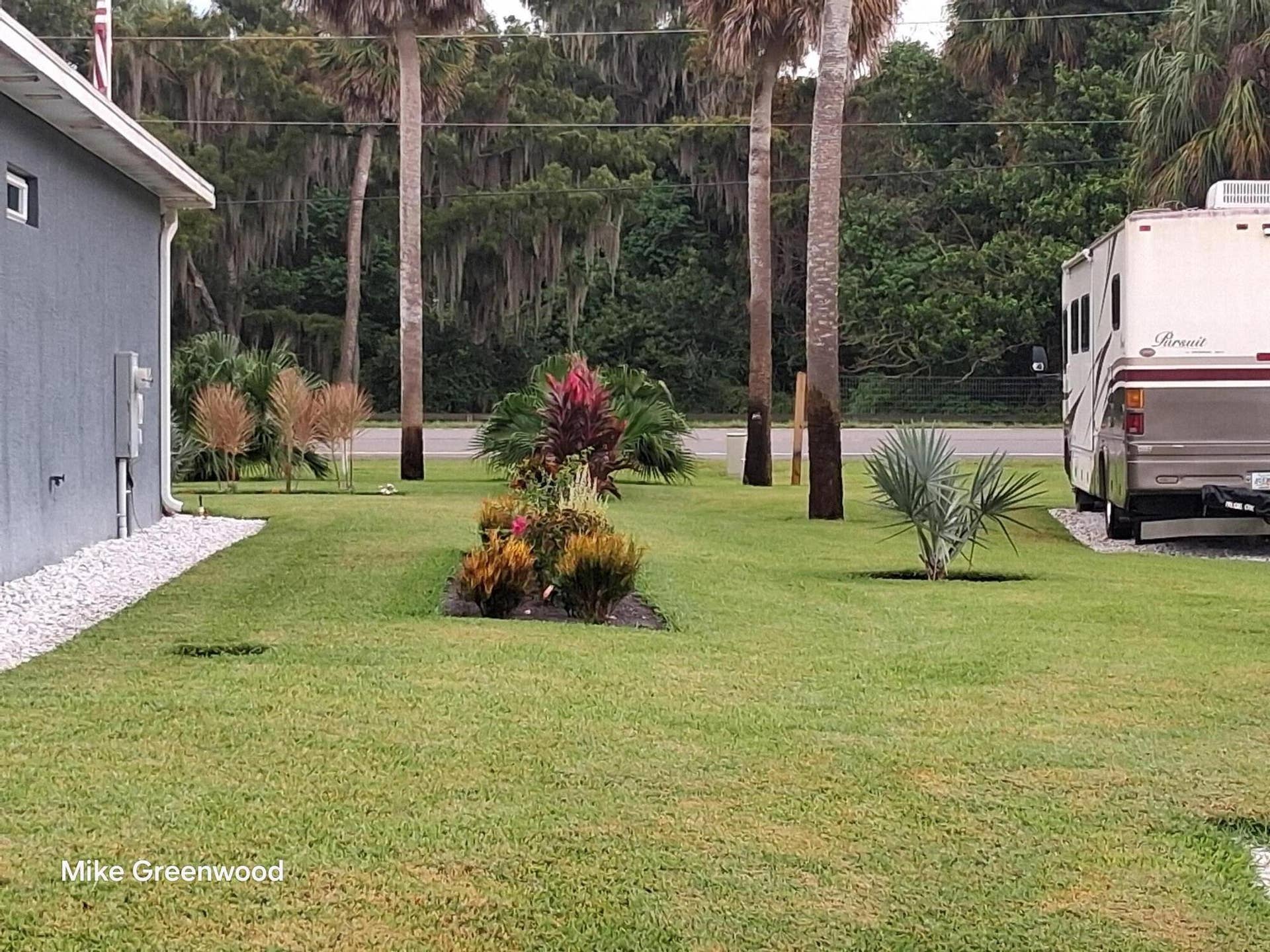 7952 SE US HIGHWAY 441 SE, Okeechobee, FL 34974 side view with rv parking