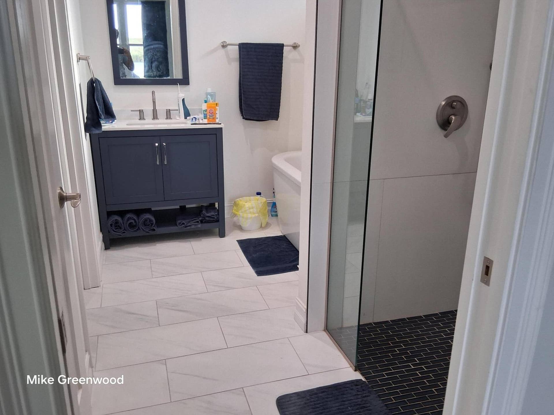 7952 SE US HIGHWAY 441 SE, Okeechobee, FL 34974 master bath with walk in shower and 58 gallon soaker tub