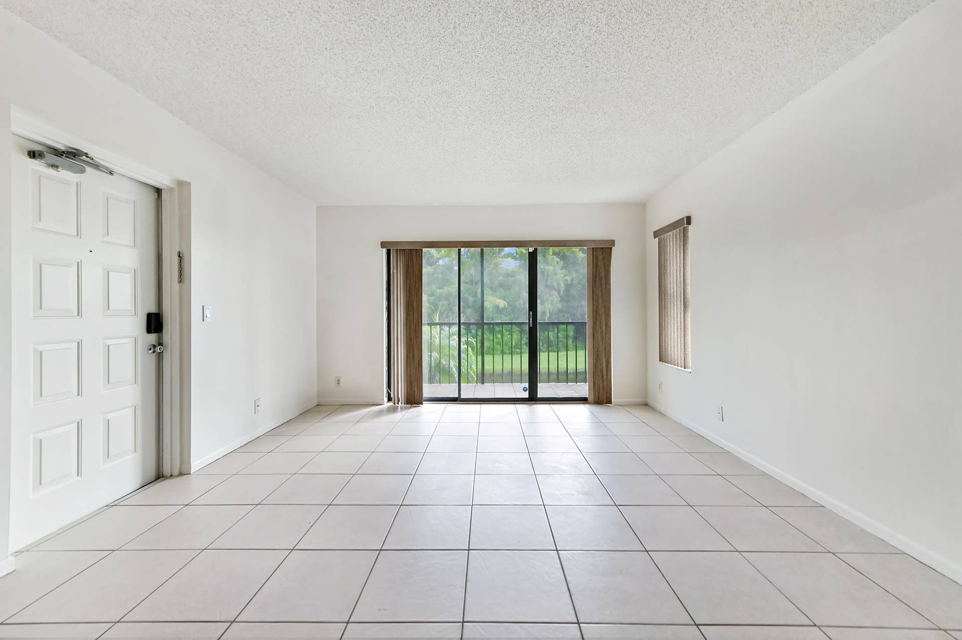 1005 Green Pine Boulevard, #C2, West Palm Beach, FL 33409 04 Living room 02