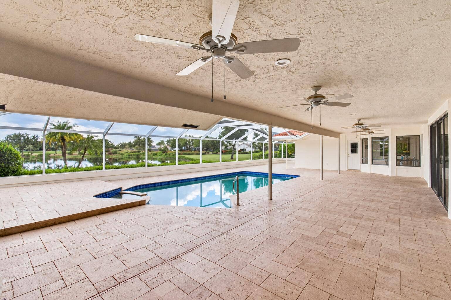 10423 Stonebridge Boulevard, Boca Raton, FL 33498 34-covered-pool-lake-view