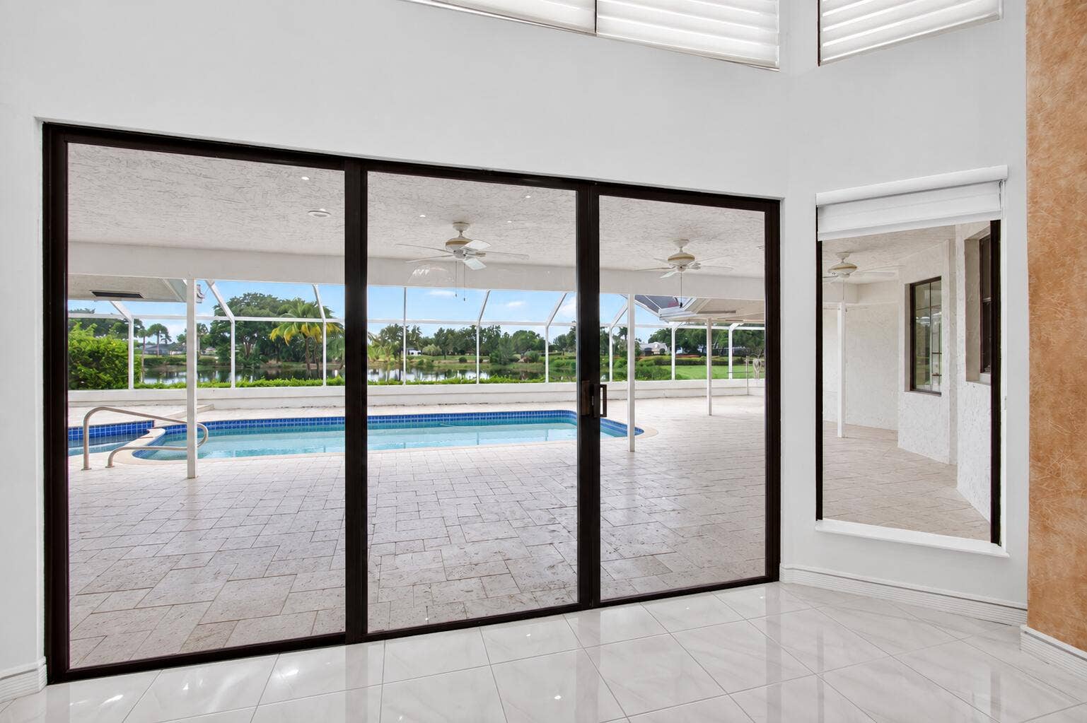 10423 Stonebridge Boulevard, Boca Raton, FL 33498 40-pool-view-from-living