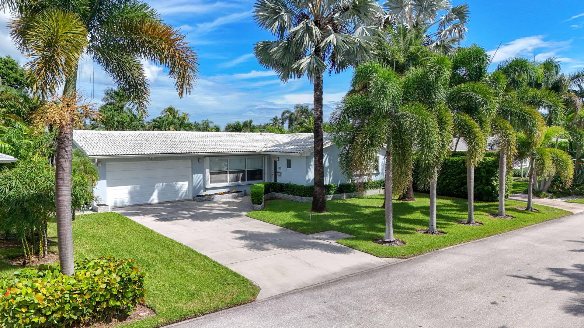 128 VASSAR Drive, Lake Worth Beach, FL 33460 64-web-or-mls-DJI_20261007234933_0315_D-
