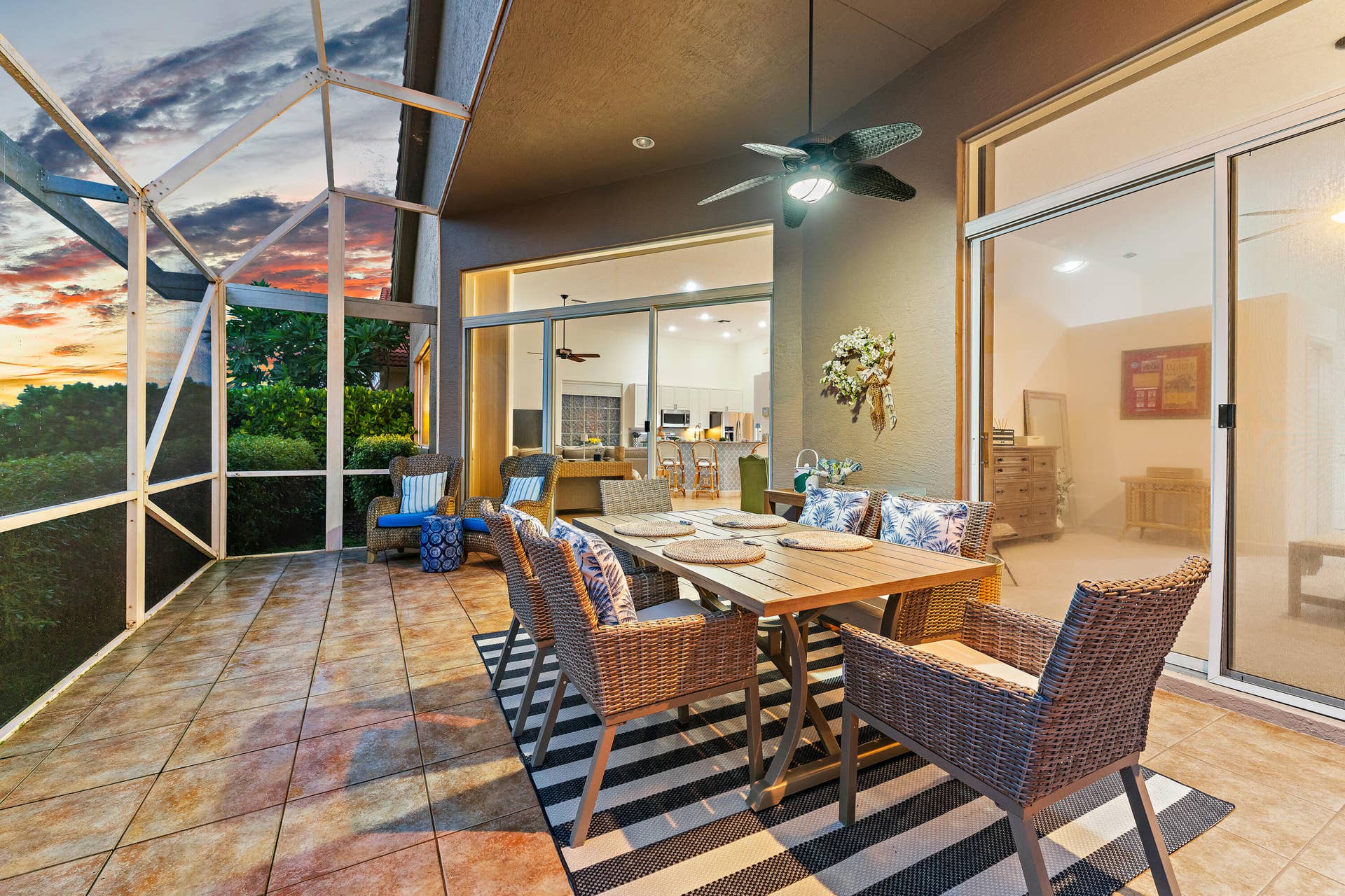 Expansive screened patio perfect for outdoor dining and entertaining