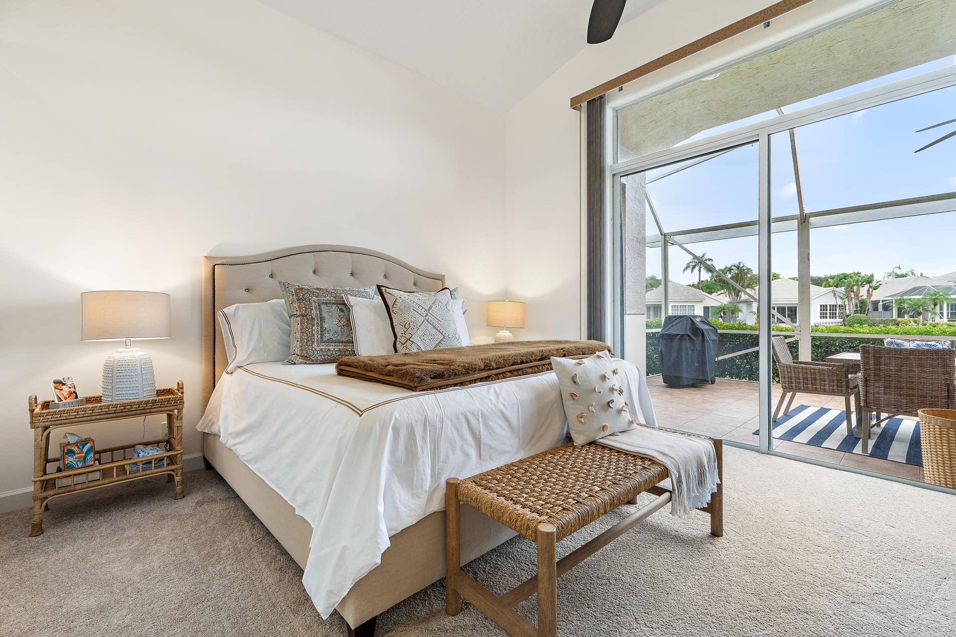 Spacious primary suite featuring volume ceilings