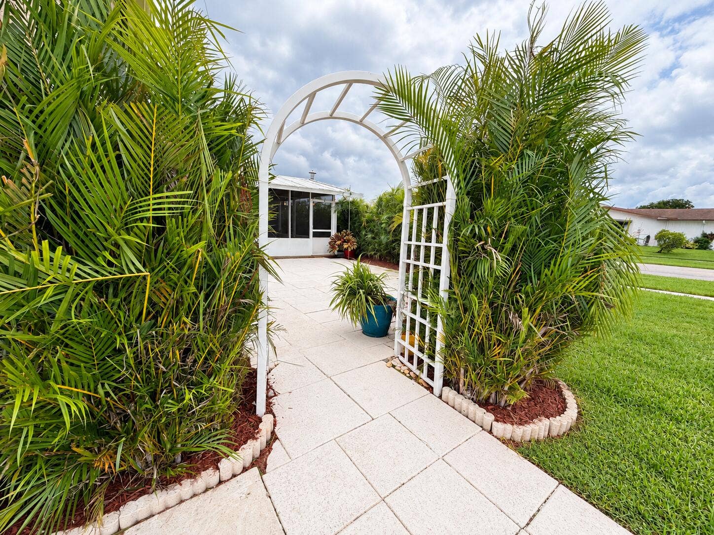Garden Arch with Lush Green Lawn