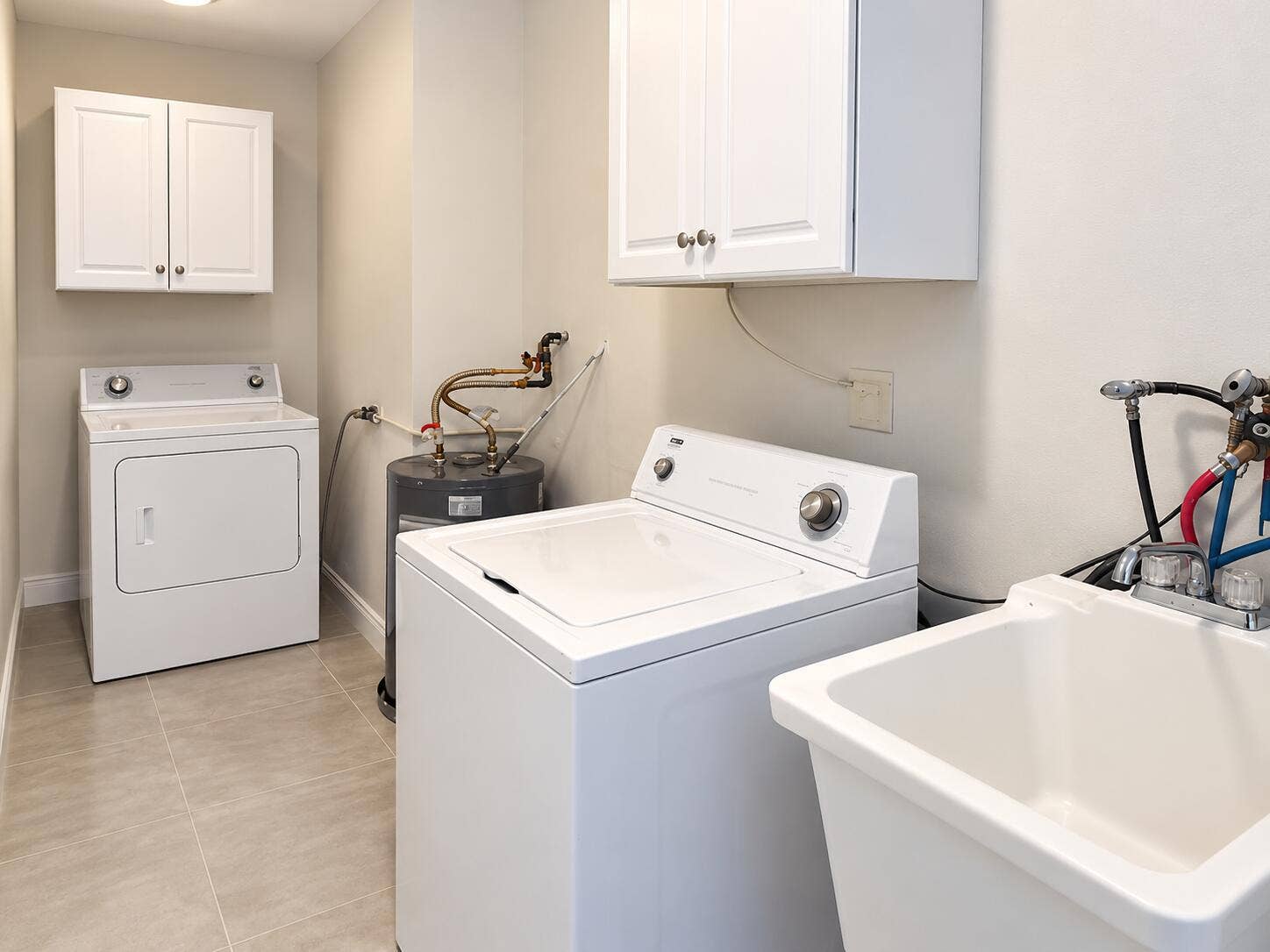 266 SW 12TH Street, Boca Raton, Boca Raton, FL 33432 01Modern Laundry Room with Exposed Plumb