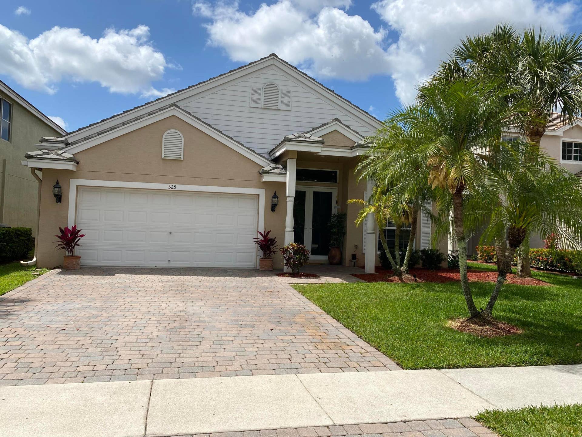 325 Berenger Walk, Royal Palm Beach, FL 33414 Front view