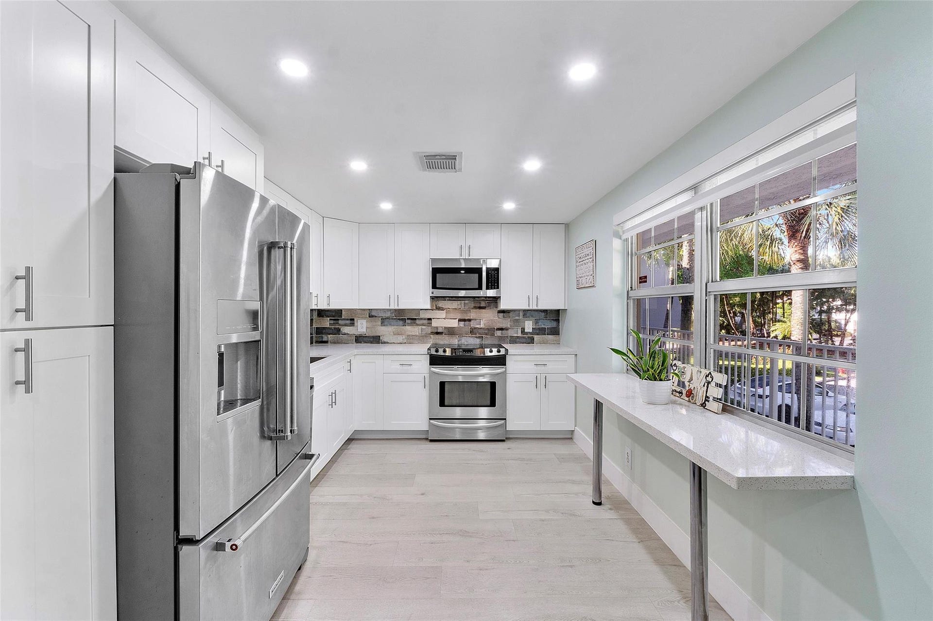 4261 W Palm Aire Drive, Pompano Beach, FL 33069 Photo 11