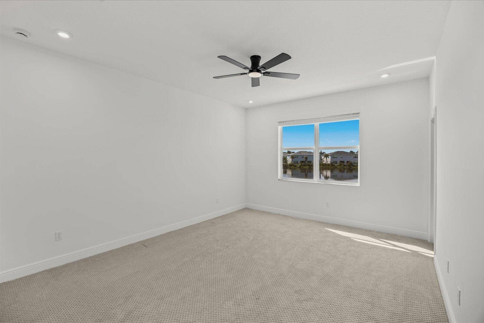 3566 NW SOLANGE Court, Jensen Beach, FL 34957 Master Bedroom with water views