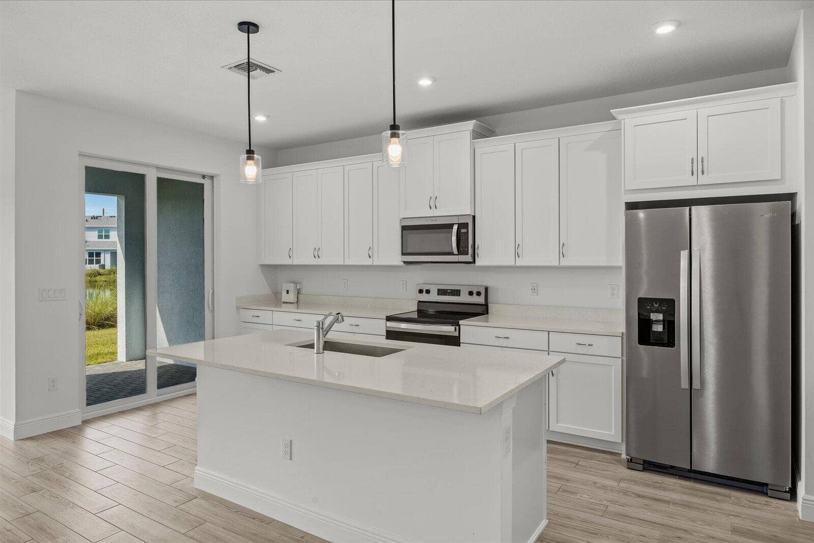 3566 NW SOLANGE Court, Jensen Beach, FL 34957 Modern Spacious Kitchen with island counter