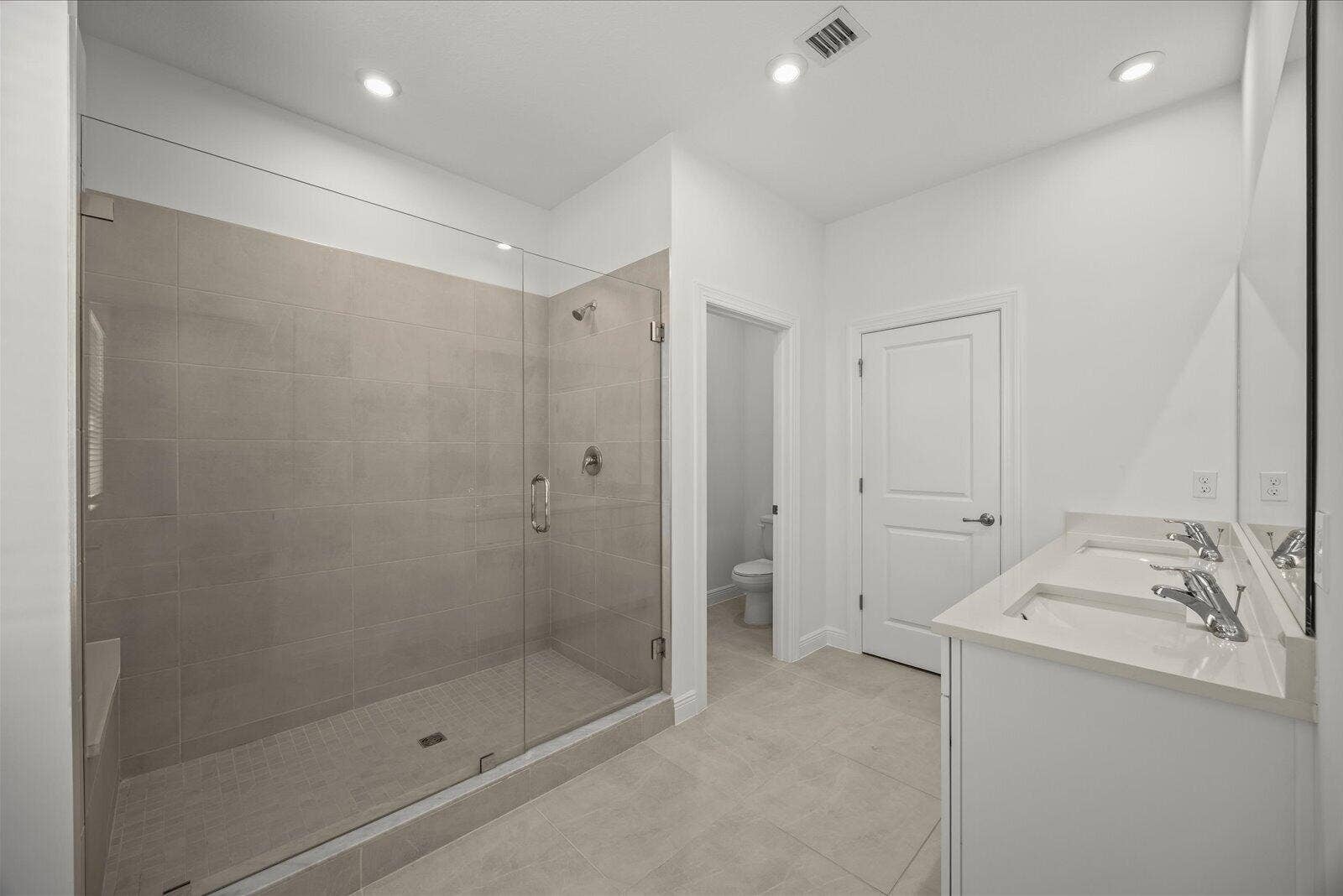 3566 NW SOLANGE Court, Jensen Beach, FL 34957 Master En Suite Bathroom with duel sinks