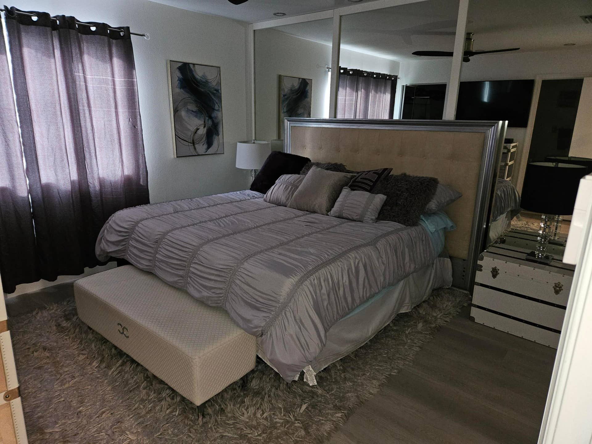 1460 SW 47TH Avenue, #1460, Deerfield Beach, Deerfield Beach, FL 33442 Wood-finish flooring with a mirrored wall and a ceiling fan