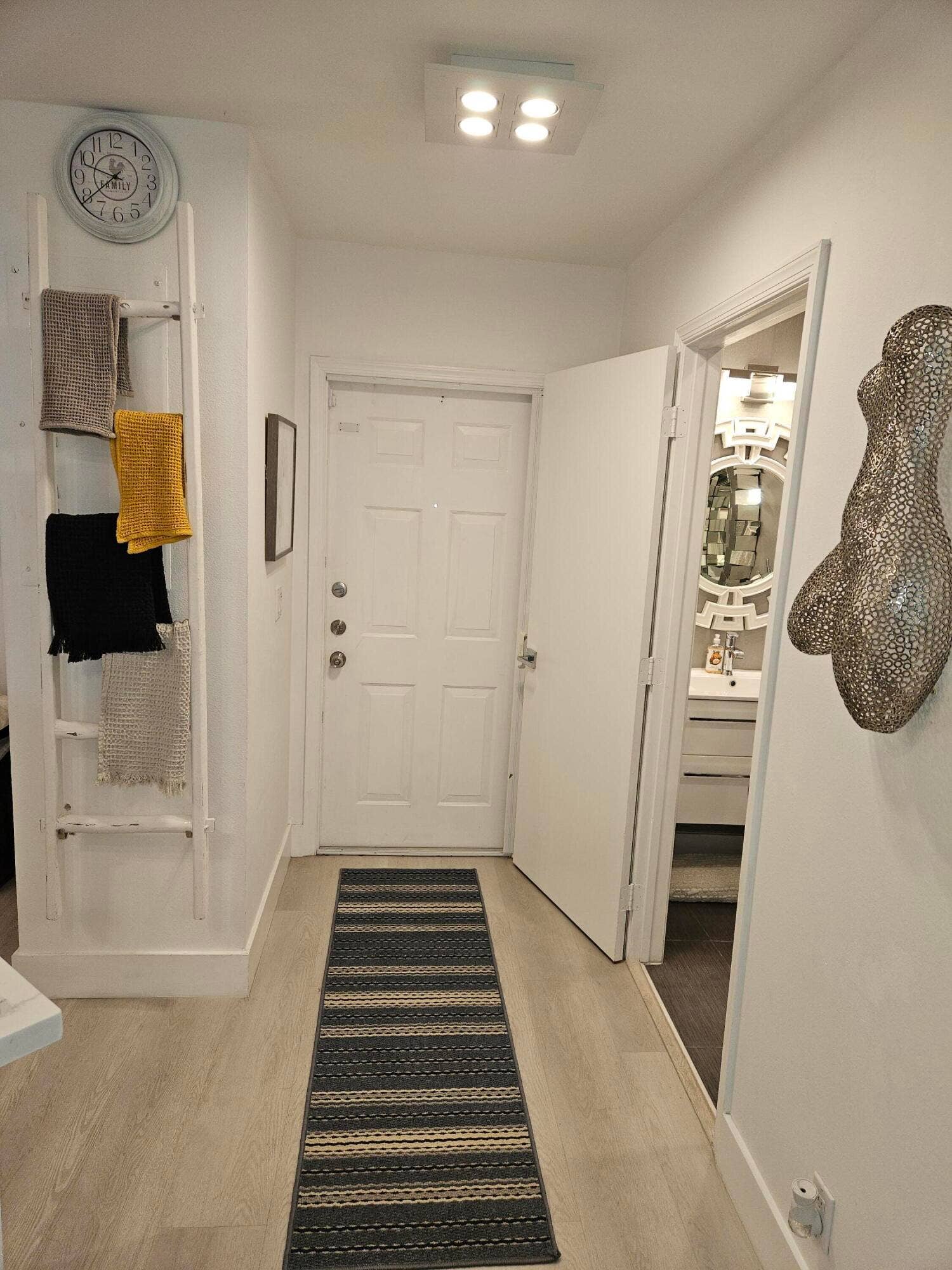 1460 SW 47TH Avenue, #1460, Deerfield Beach, Deerfield Beach, FL 33442 White paneled door, wood-finish flooring, and recessed ceiling lighting