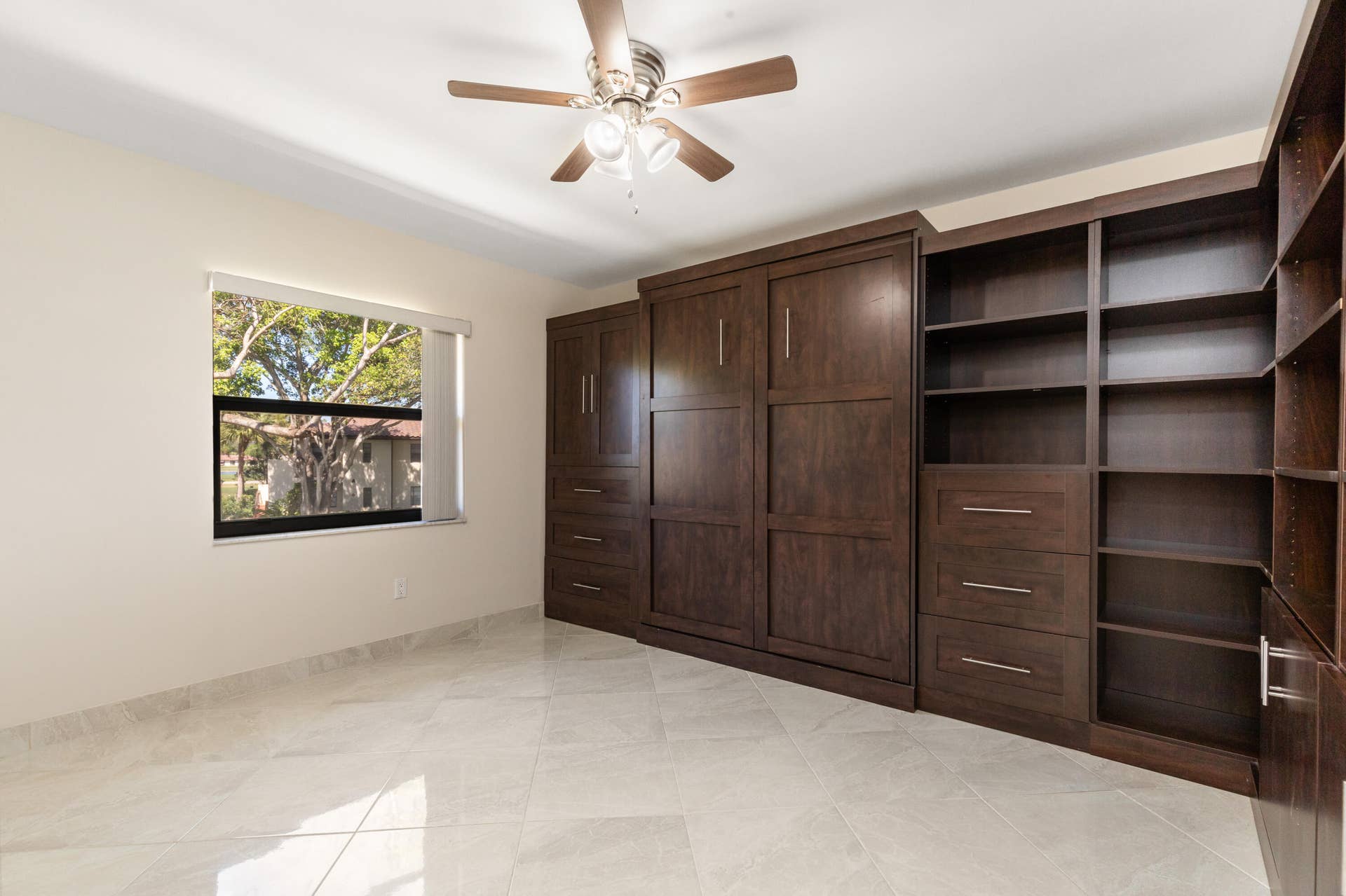 Custom made Murphy bed and bookcase (can be removed at buyer request).