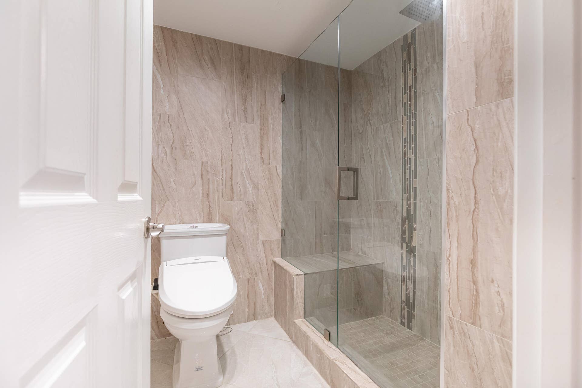 Toilet with hot water bidet seat.