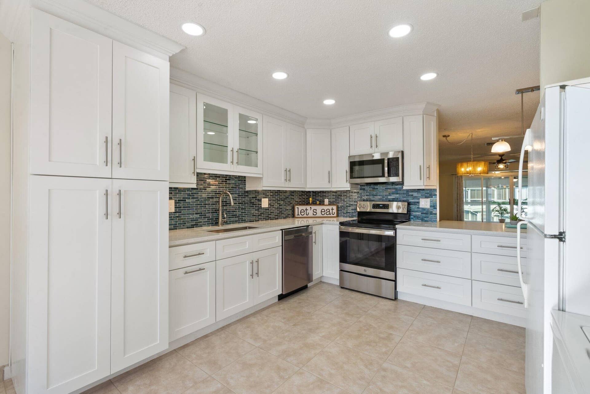 White Cabinets, SS Appliances
