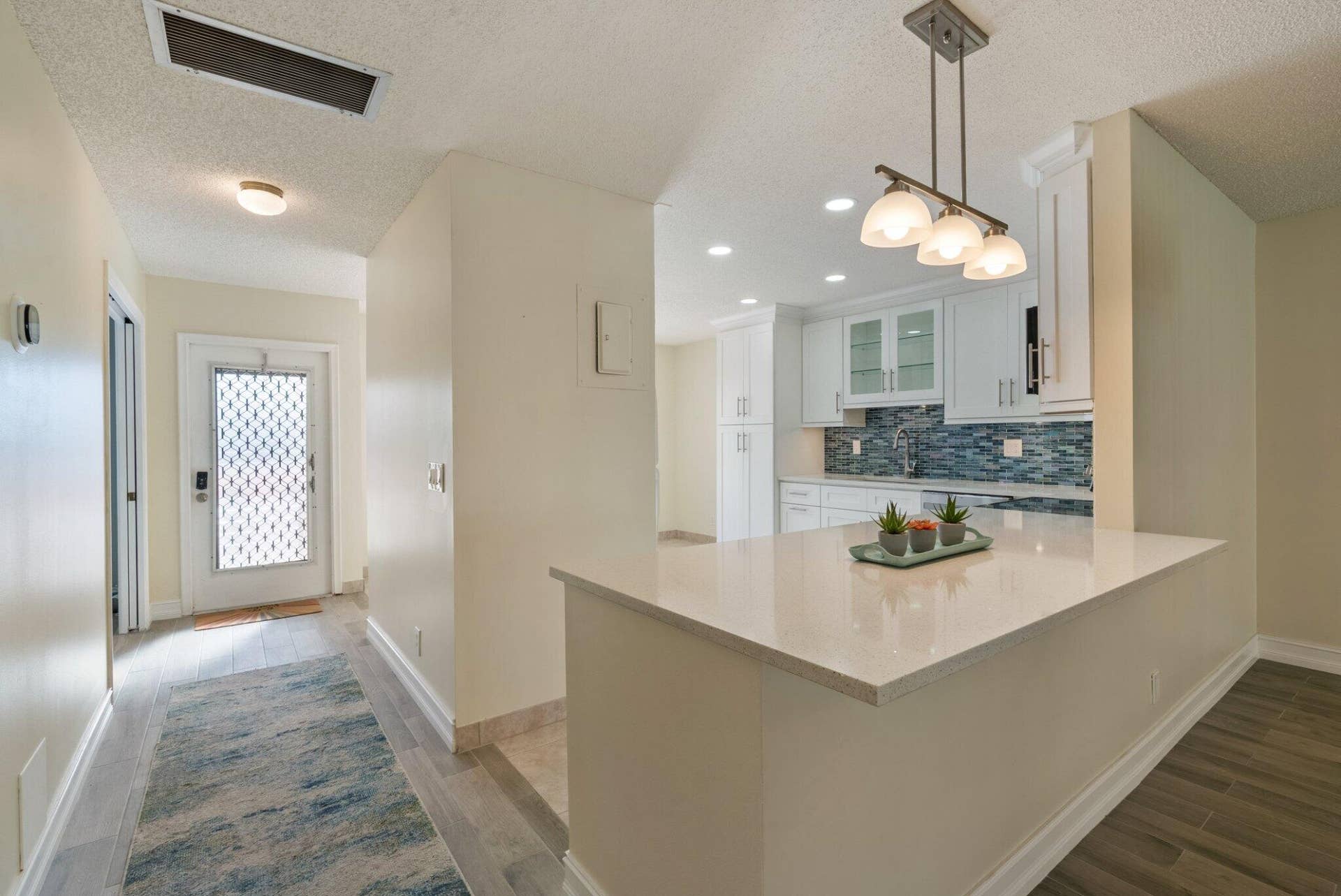 Foyer Entry with 2 options for entering the kitchen area