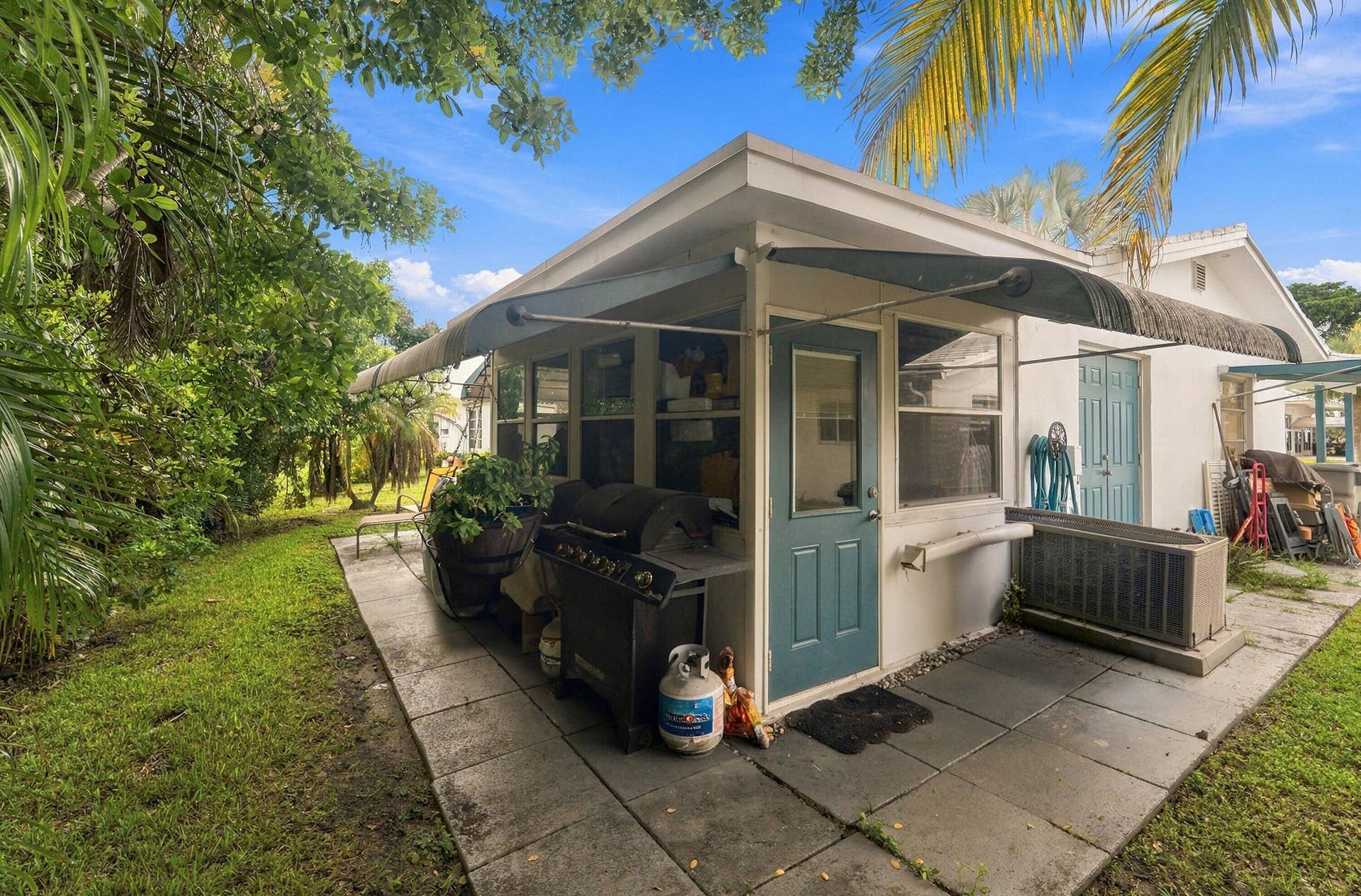 111 NW 25TH Court, Pompano Beach, FL 33064 Back Of Home. Next Photo Staged