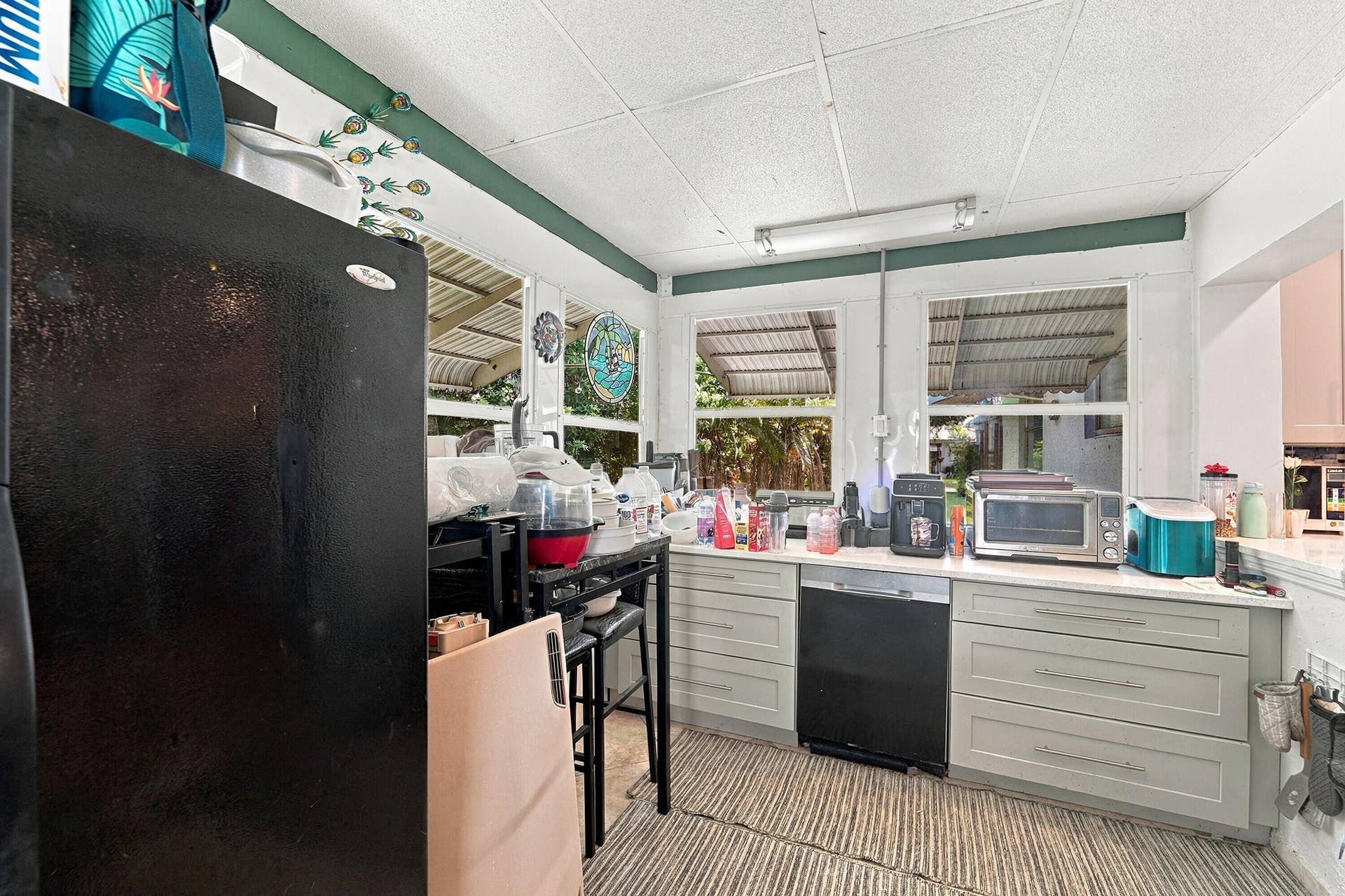 111 NW 25TH Court, Pompano Beach, FL 33064 Enclosed Porch Off Of Kitchen