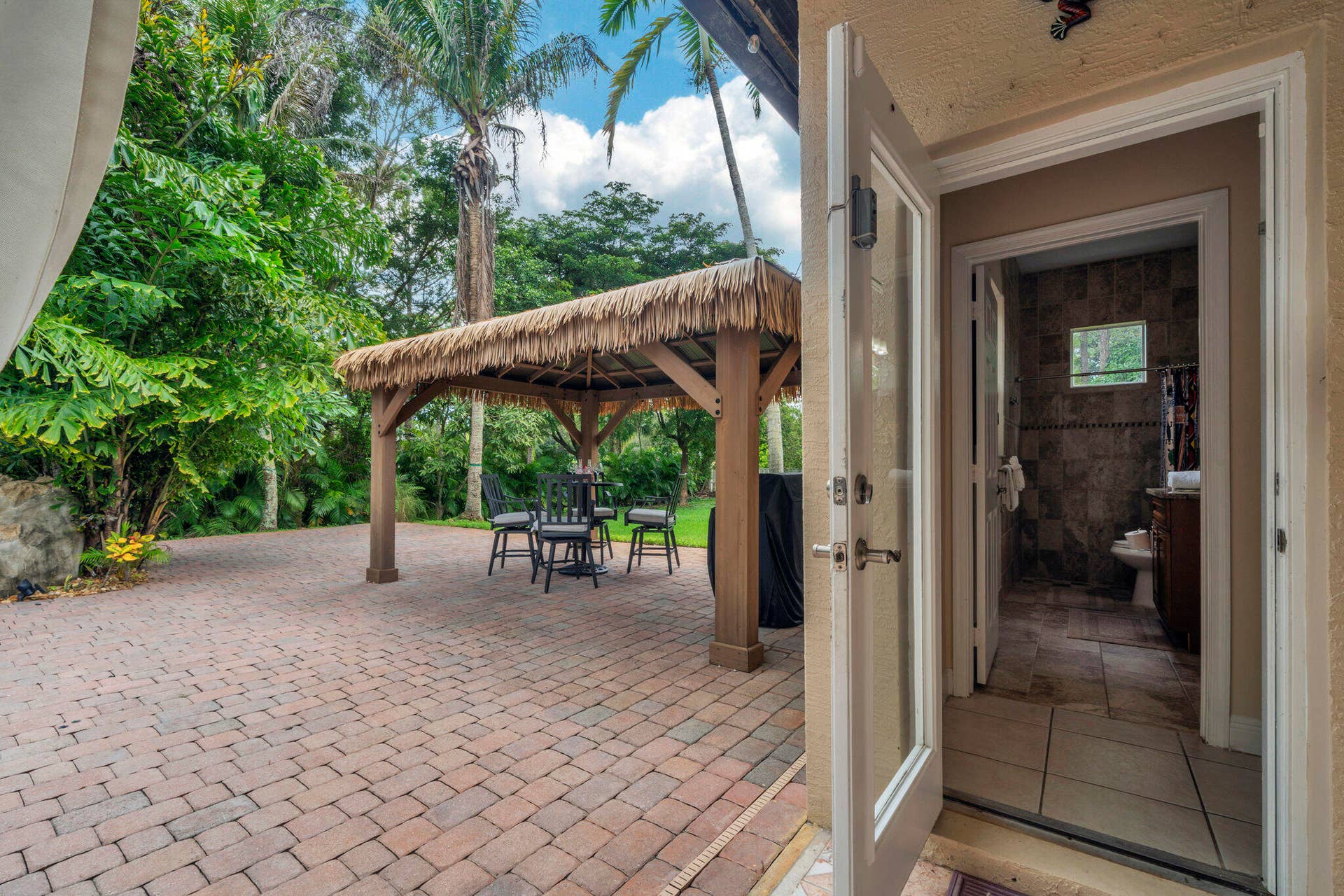 15250 Temple Boulevard, Loxahatchee, FL 33470 Entrance to Cabana Bathroom from patio