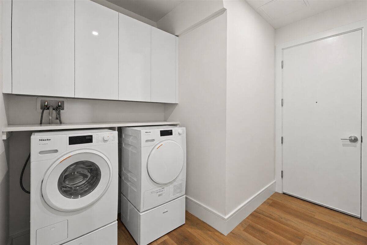 220 LAKE SHORE Drive, #2406, West Palm Beach, FL 33403 61-Minimalist White-and-Wood Laundry Roo