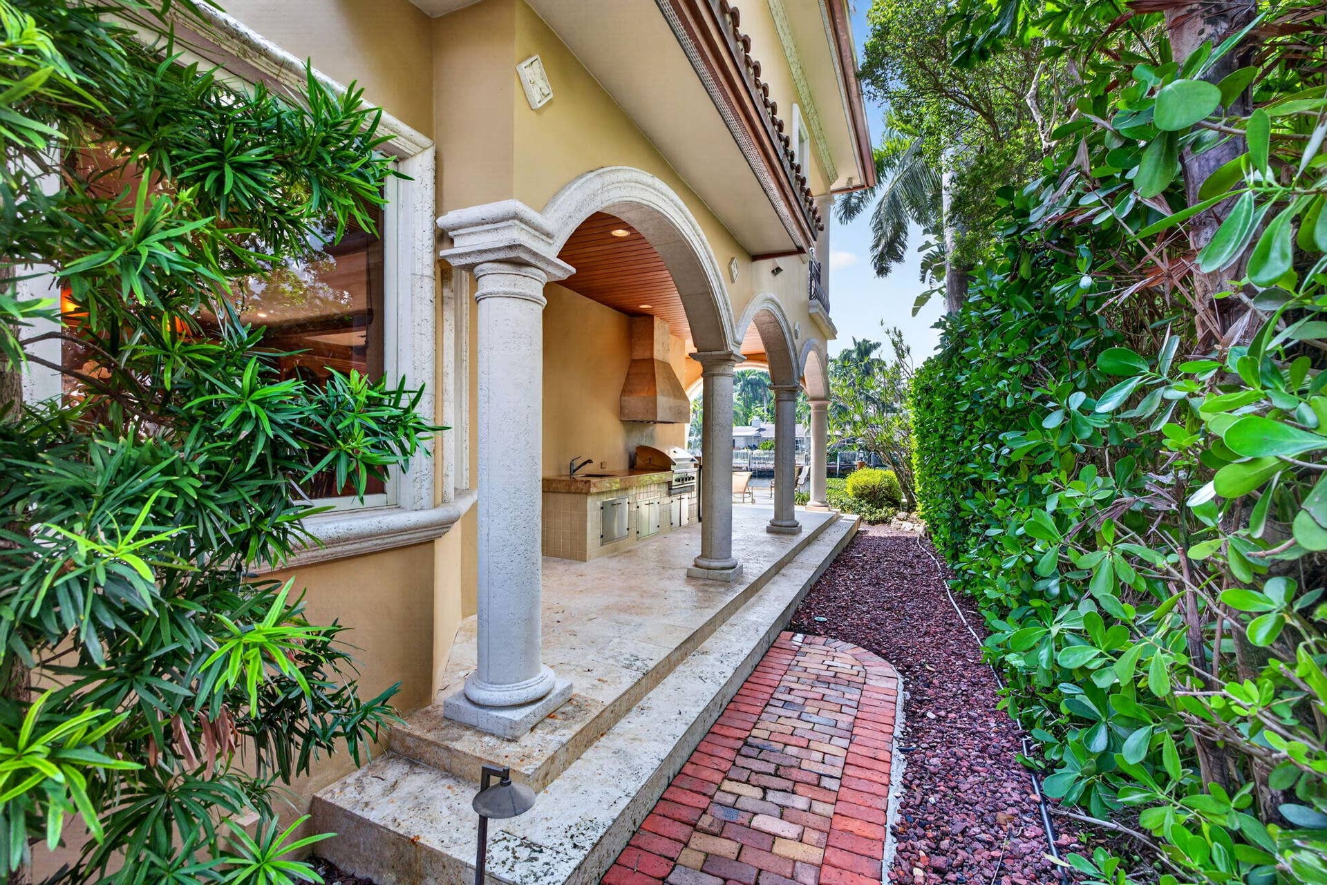 67 ROYAL PALM Drive, Fort Lauderdale, FL 33301 143_Side_Walkway_and_Summer_Kitchen