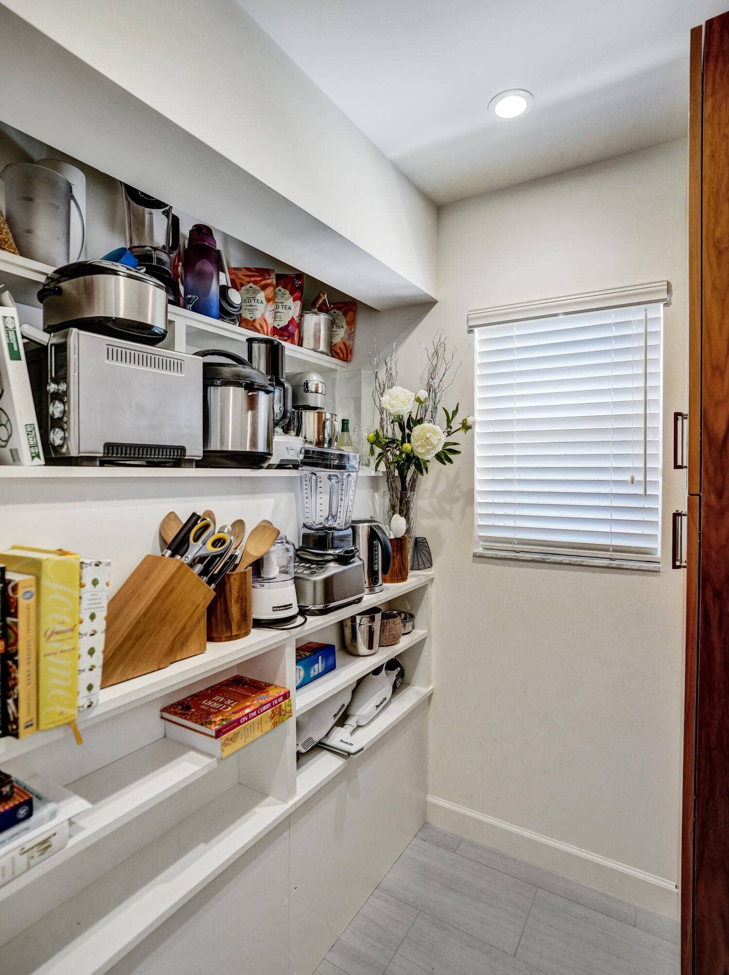 Pantry located as soon as you enter the house from the garage.