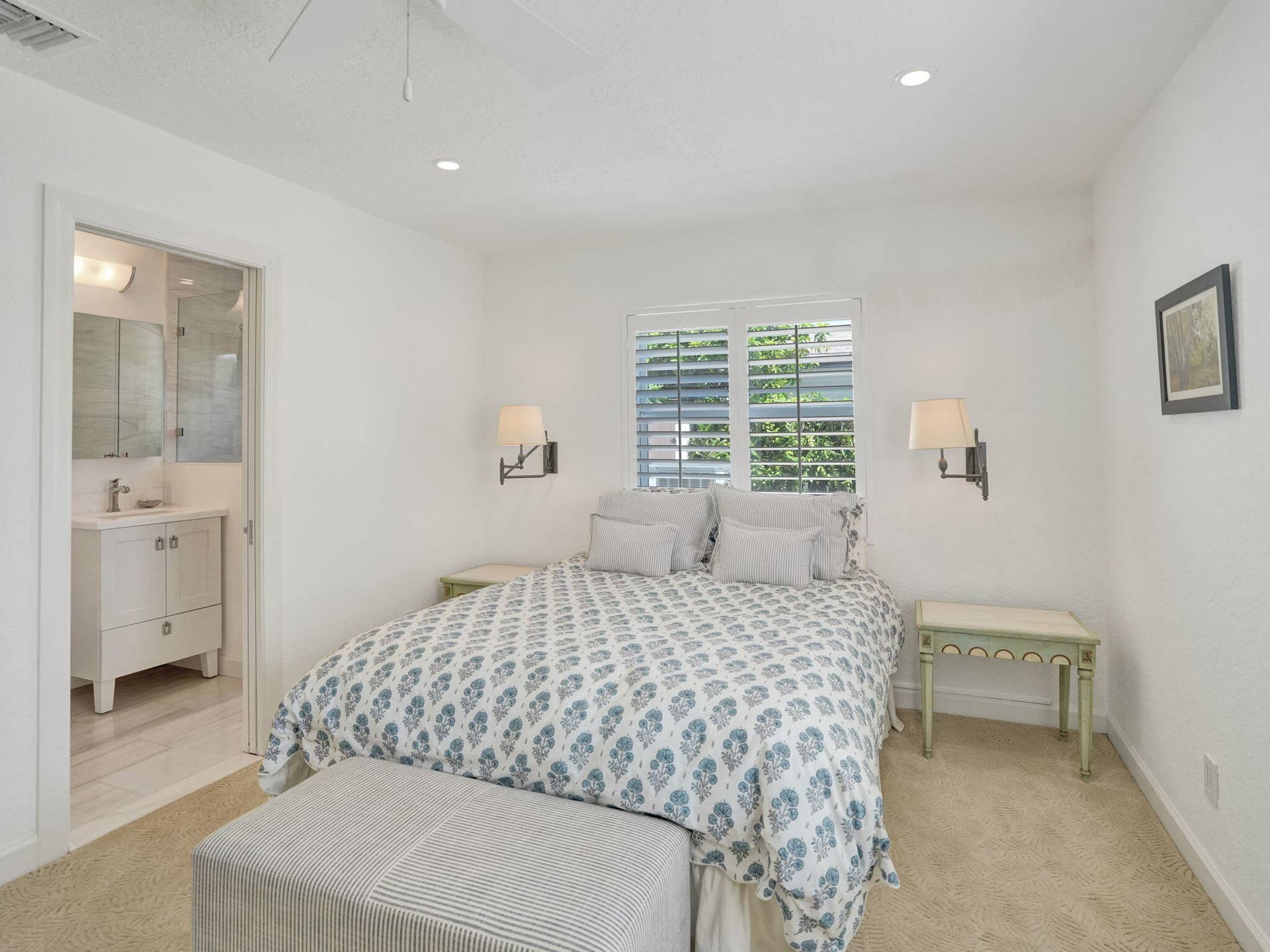 Spacious Bedroom with recessed lighting.